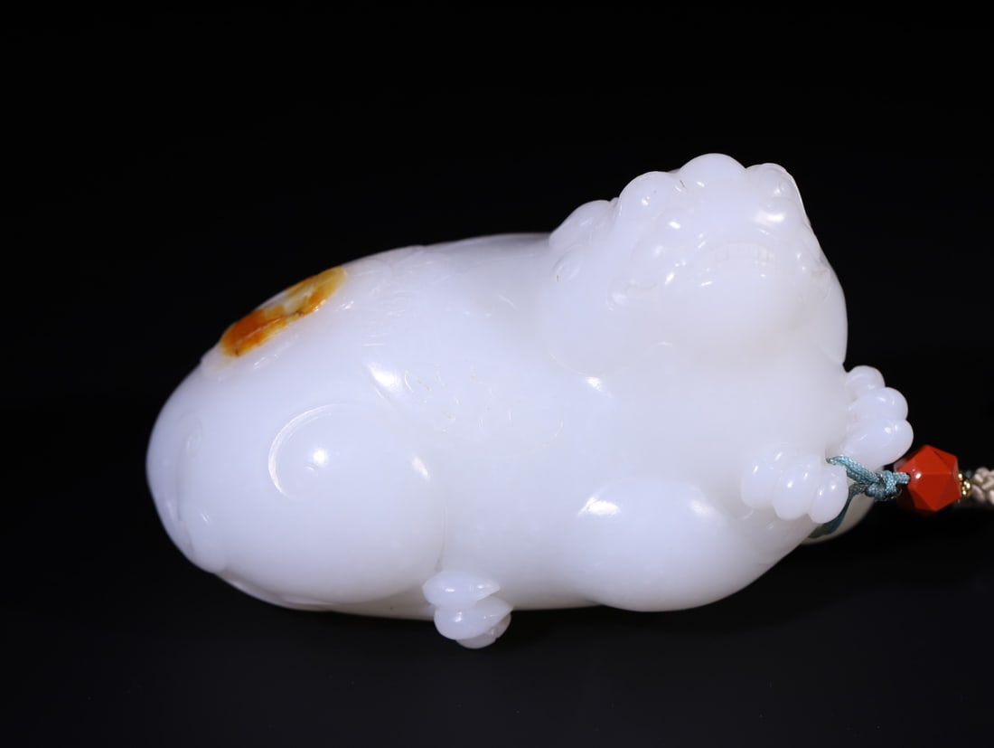 A Exquisite Hotan Jade Auspicious Beast Ornament: A Exquisite Hotan Jade Auspicious Beast Ornament,Qing Dynasty, China,Size:3.5inx1.8inx2in,Weight:311.3g 和田玉瑞兽摆件,中国清代