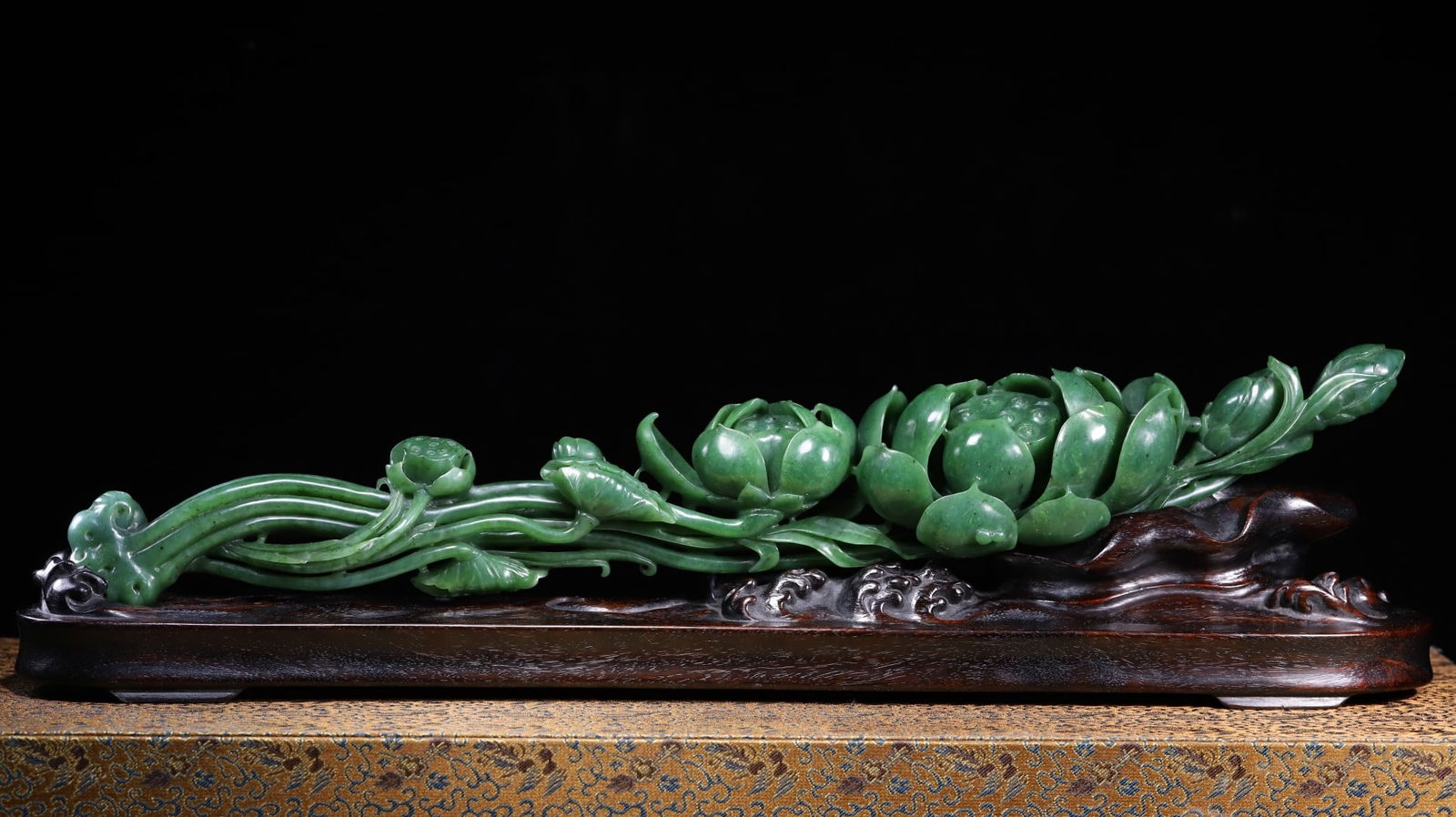 A Exquisite Hotan Jasper Ruyi Ornament: A Exquisite Hotan Jasper Ruyi Ornament,Qing Dynasty, China,Size:18.1inx2.1inx2.5in,Weight:882g 和田碧玉如意摆件,中国清代