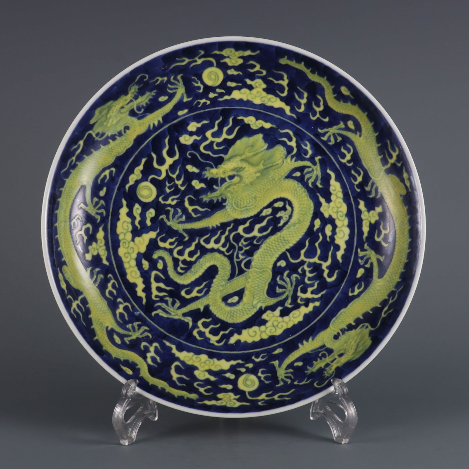 A Rare Blue and White Blue Ground Yellow Color Cloud and Dragon Pattern Large Plate: A Rare Blue and White Blue Ground Yellow Color Cloud and Dragon Pattern Large Plate,Qing Dynasty, China,Daoguang Six-character Mark,Size:1.7inx10.6in 