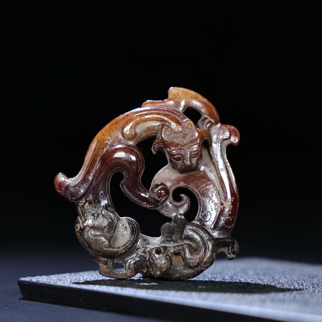 A Exquisite Hetian Jade Dragon Handheld Ornament: A Exquisite Hetian Jade Dragon Handheld Ornament,Han Dynasty, China,Size:2.4inx2.4inx0.6in,Weight:47g 和田玉龙手把件,中国汉代