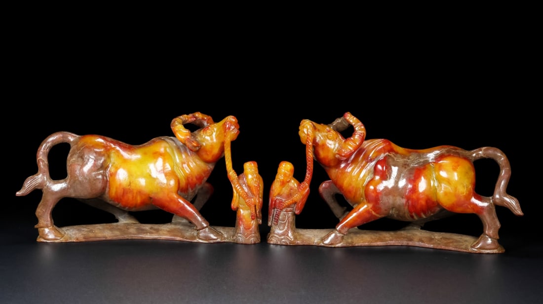 A pair of Exquisite Hotan Jade Buffalo Ornament: A pair of Exquisite Hotan Jade Buffalo Ornament,Han Dynasty, China 一对和田玉牛摆件,中国汉代
