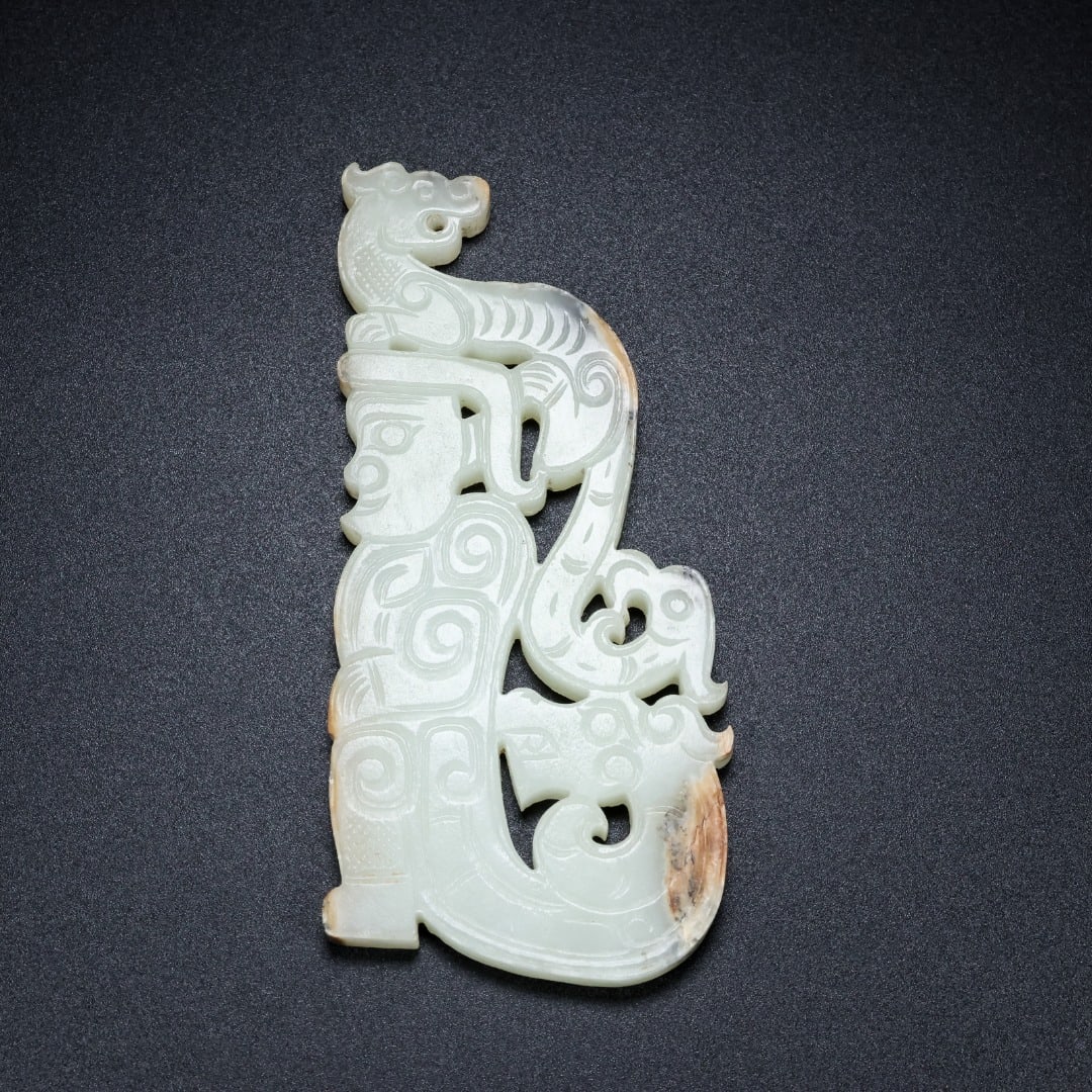 A Exquisite Hotan Jade Human-Shaped Jade Bi: A Exquisite Hotan Jade Human-Shaped Jade Bi,Qing Dynasty, China,Size:4.1inx1.9inx0.2in,Weight:57.6g 和田玉人形玉璧,中国清代
