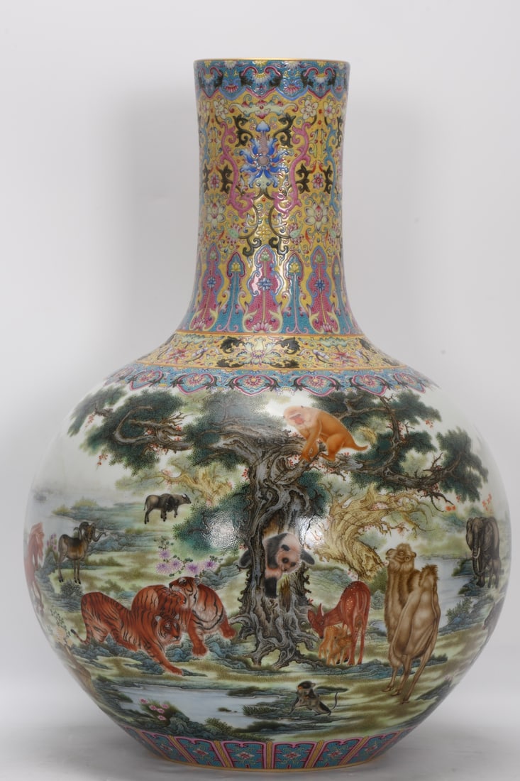 A Exquisite Famille-Rose Beast-Pattern Vase: A Exquisite Famille-Rose Beast-Pattern Vase,Qing Dynasty, China,Qianlong Four-character Mark,Size:21.4inx4.8inx15.2inx7.3in 