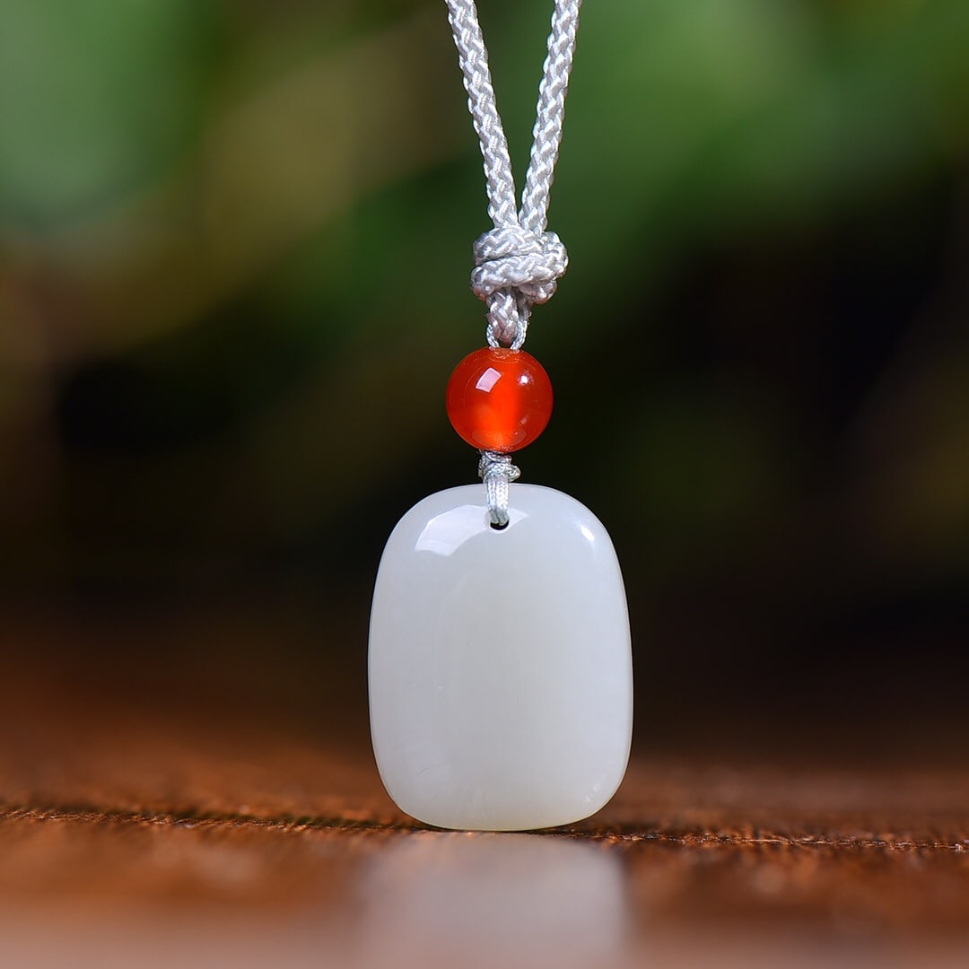 A Exquisite Hotan Jade Pendant: A Exquisite Hotan Jade Pendant,Size:0.6inx0.8in 和田玉平安无事牌