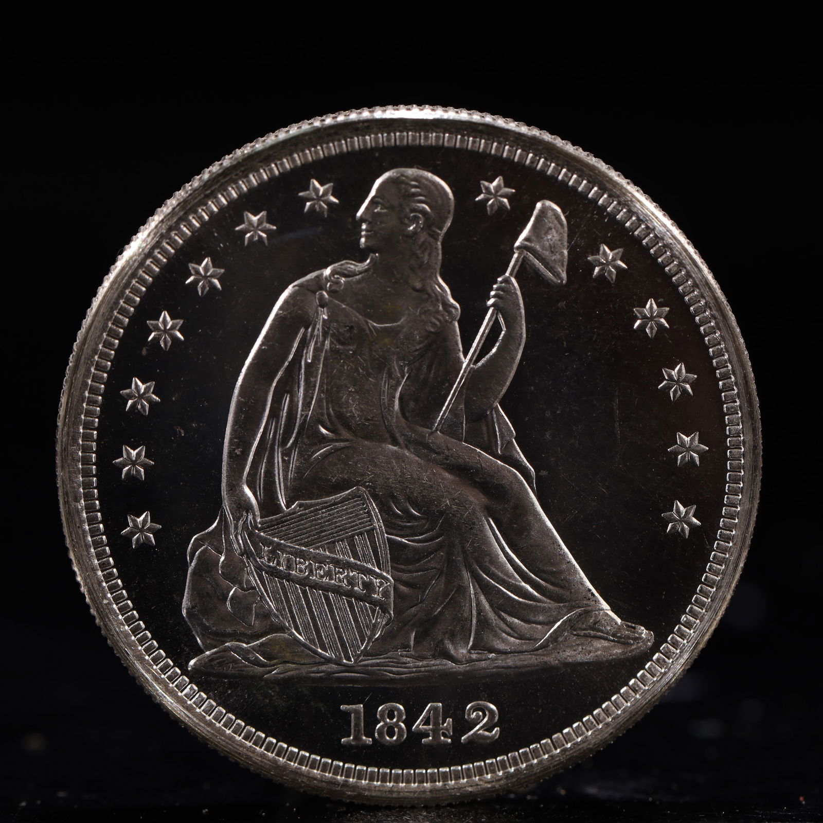 USA One Dollar 1842 Coin: American coin. IN GOD WE TRUST / LIBERTY / 1842 / UNITED STATES OF AMERICA / ONE DOL. Weight:26.9g.