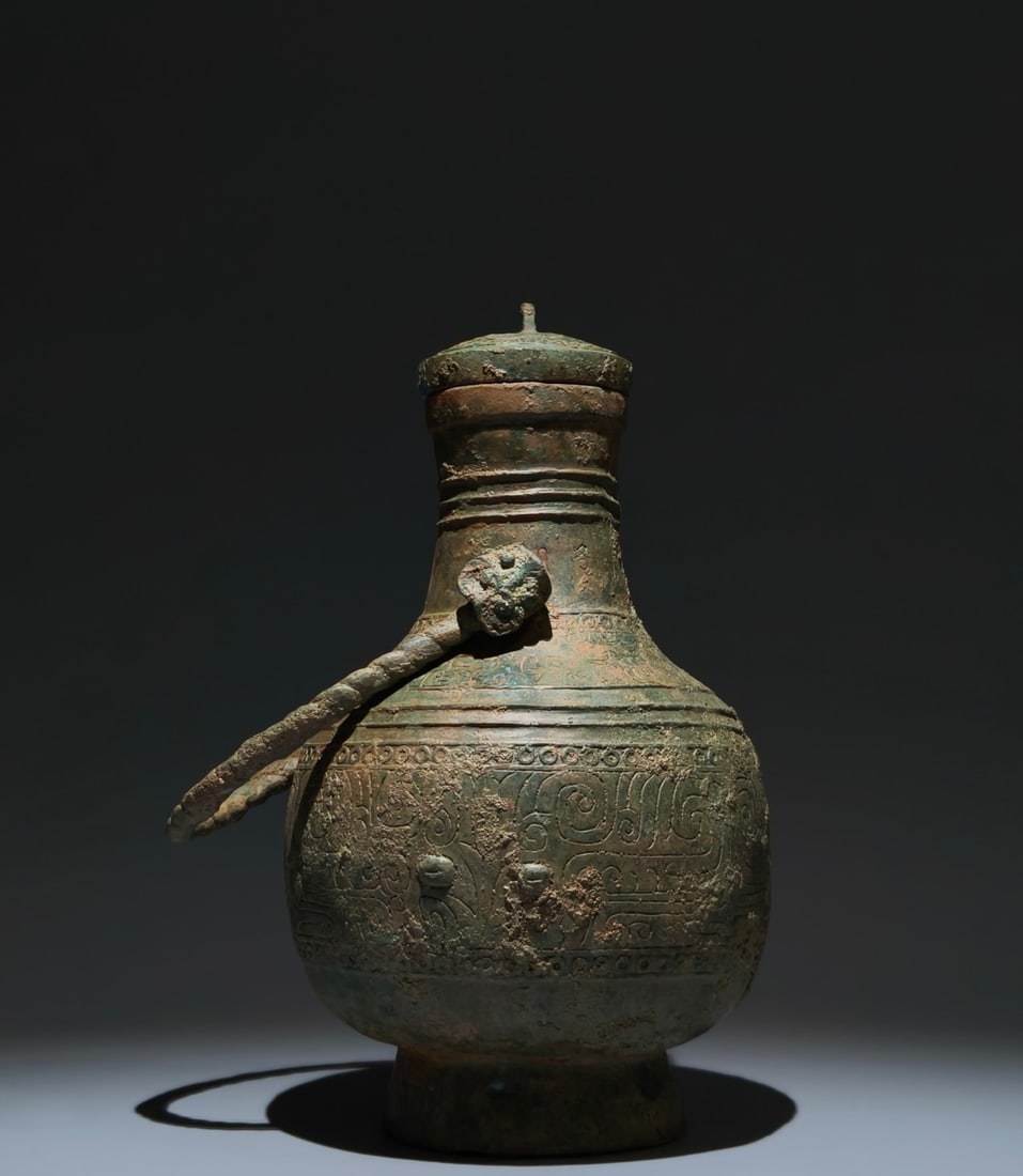 An Archaic Bronze Ruyi Pattern Ewer,With Inscription (1 of 9)
