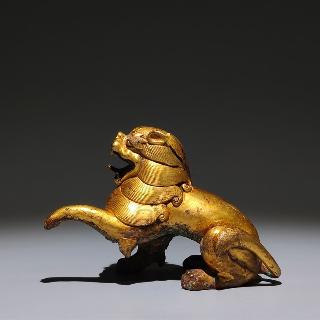 An Exquisite Gilt Bronze Auspicious Beast Ornament (1 of 9)