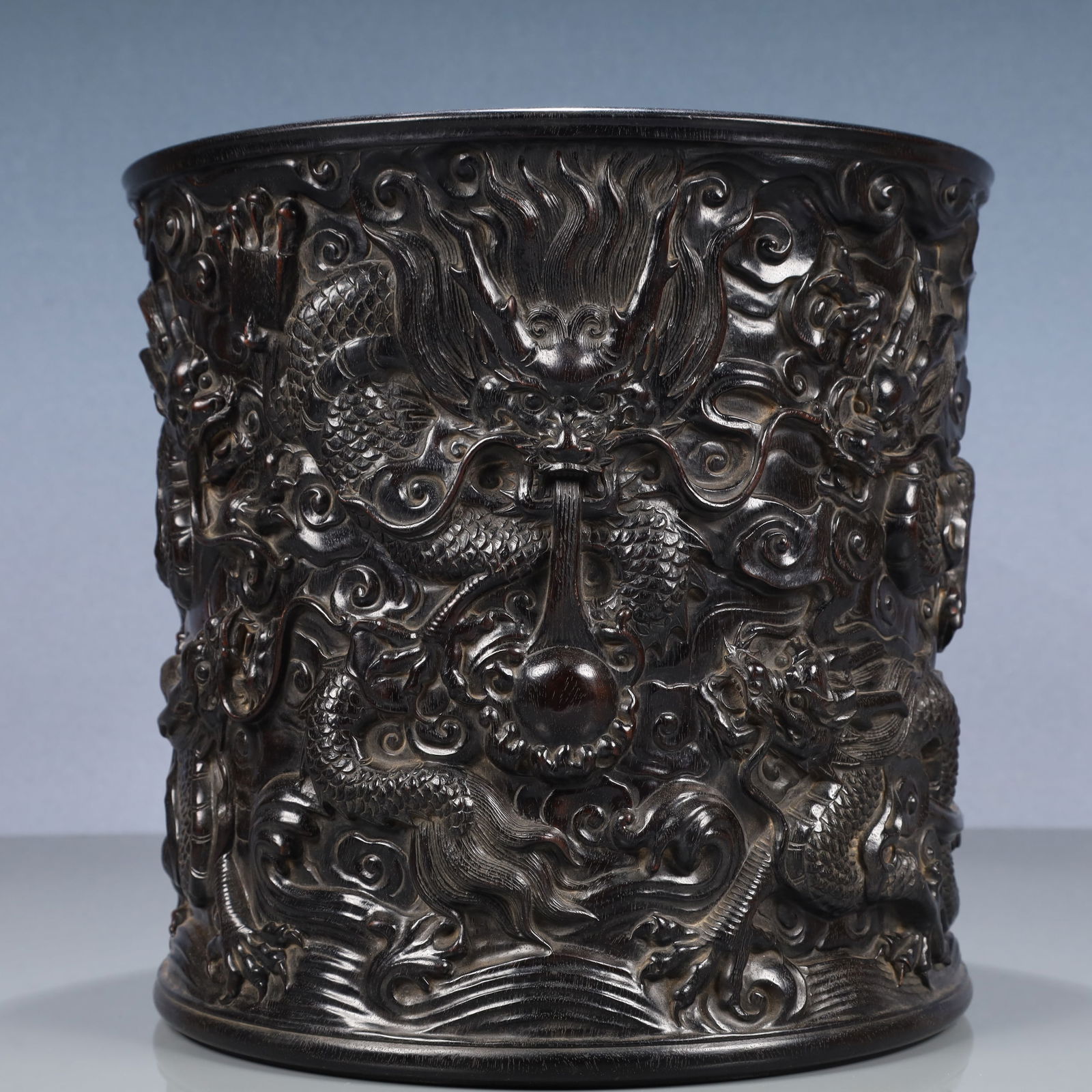 An Exquisite Zitanwood Auspicious Cloud and Dragon Pattern Brush Pot: An Exquisite Zitanwood Auspicious Cloud and Dragon Pattern Brush Pot,Qing Dynasty, China,Size:10.6inx10.2in,Weight:3500g 紫檀木祥云龙纹笔筒,ߑ