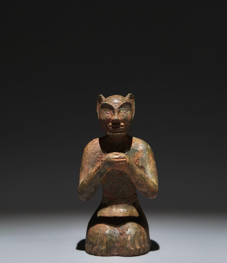 An Archaic Bronze Figure Ornament: An Archaic Bronze Figure Ornament,Han Dynasty, China,Size:5.9inx3.3inx2.8in 青铜人物摆件,中国汉代
