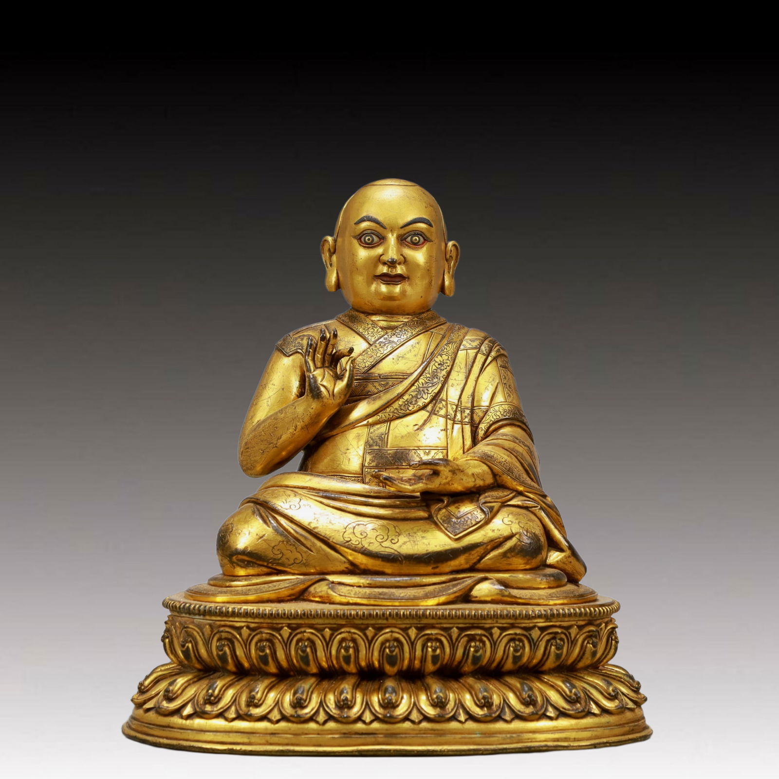 A Solemn Gilt Bronze Statue of Guru: A Solemn Gilt Bronze Statue of Guru,Ming Dynasty, China,Size:10.2inx7.9inx11.8in,Weight:7150g 铜鎏金上师像,中国明代