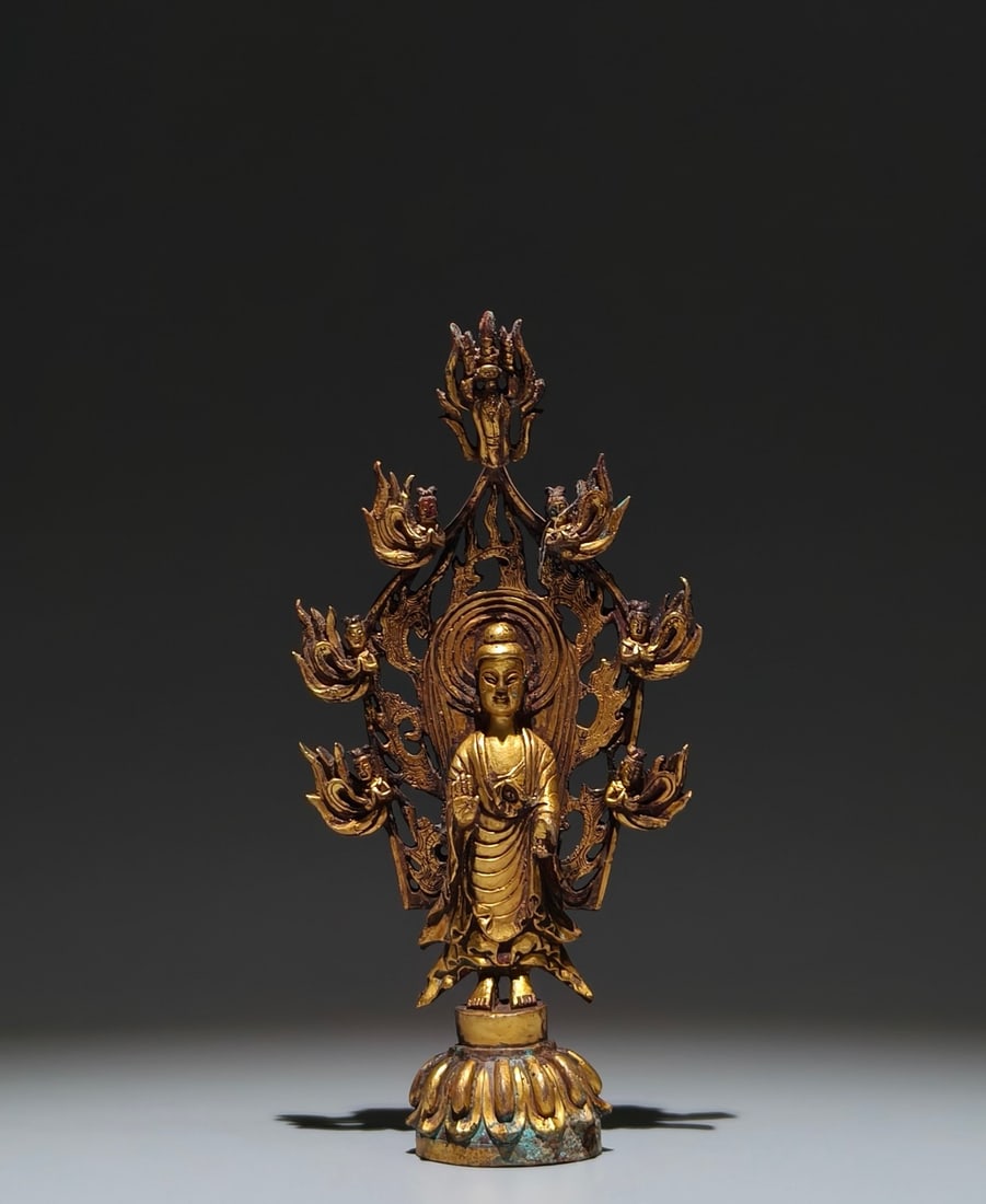 A Solemn Gilt Bronze Buddha Statue: A Solemn Gilt Bronze Buddha Statue,Tang Dynasty, China,Size:8.7inx4.3inx1.6in 铜鎏金佛像,中国唐代