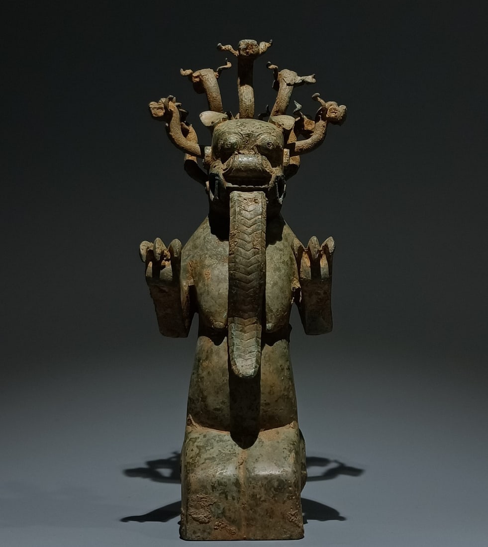 An Archaic Bronze Auspicious Beast Ornament: An Archaic Bronze Auspicious Beast Ornament,the Warring States period in China,Size:15.4inx6.3inx4.7in 