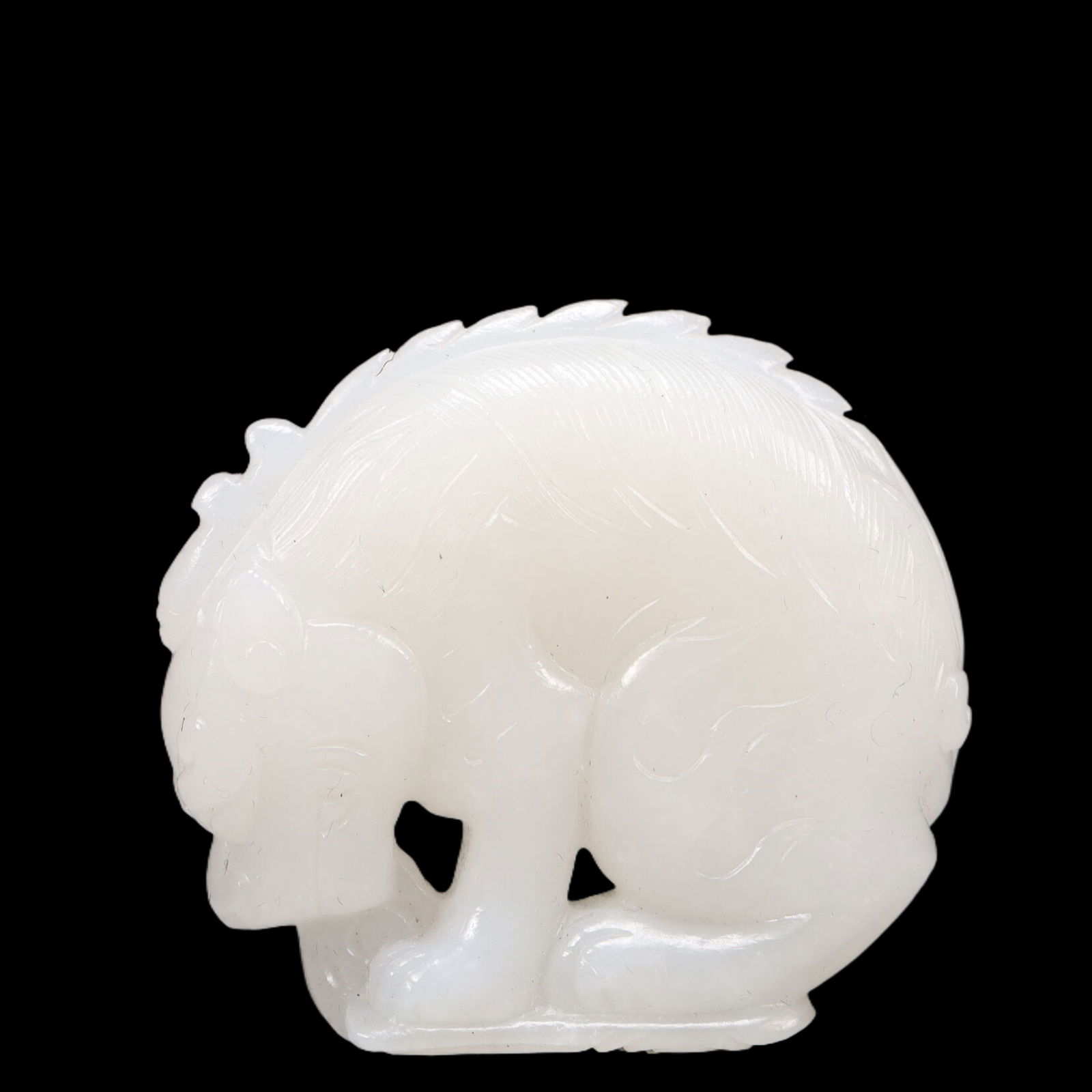 An Exquisite White Jade Lion Ornament: An Exquisite White Jade Lion Ornament, Qing Dynasty, China, Size:2inx0.6inx1.8in, Weight:70g 