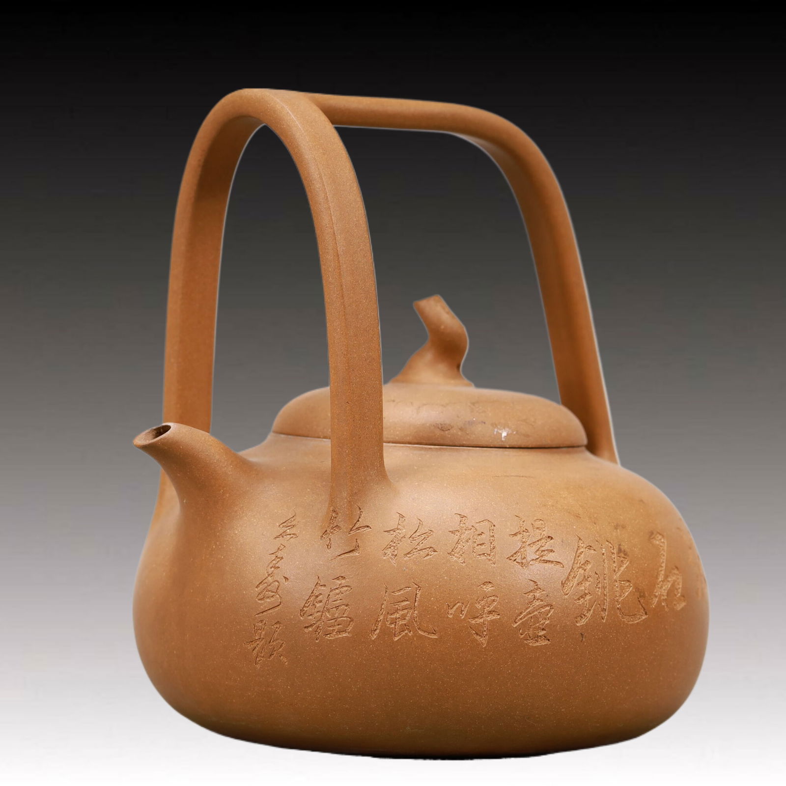 A Yixing Clay Ewer With Poem Inscriptions And An Overhead Handle (1 of 12)