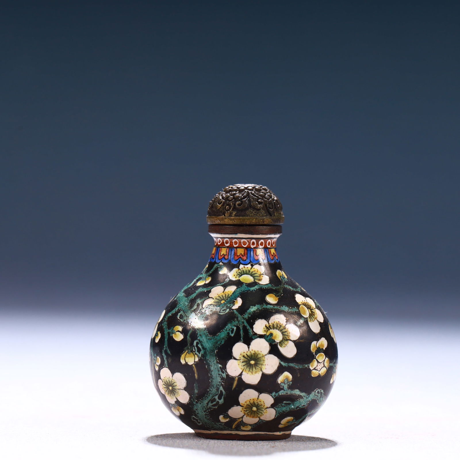 An Exquisite Painted Enamel Plum Blossom Pattern Snuff Bottle: An Exquisite Painted Enamel Plum Blossom Pattern Snuff Bottle,Qing Dynasty, China,Qianlong Four-character Mark,Size:1.4inx0.6inx2in,Weight:40g 