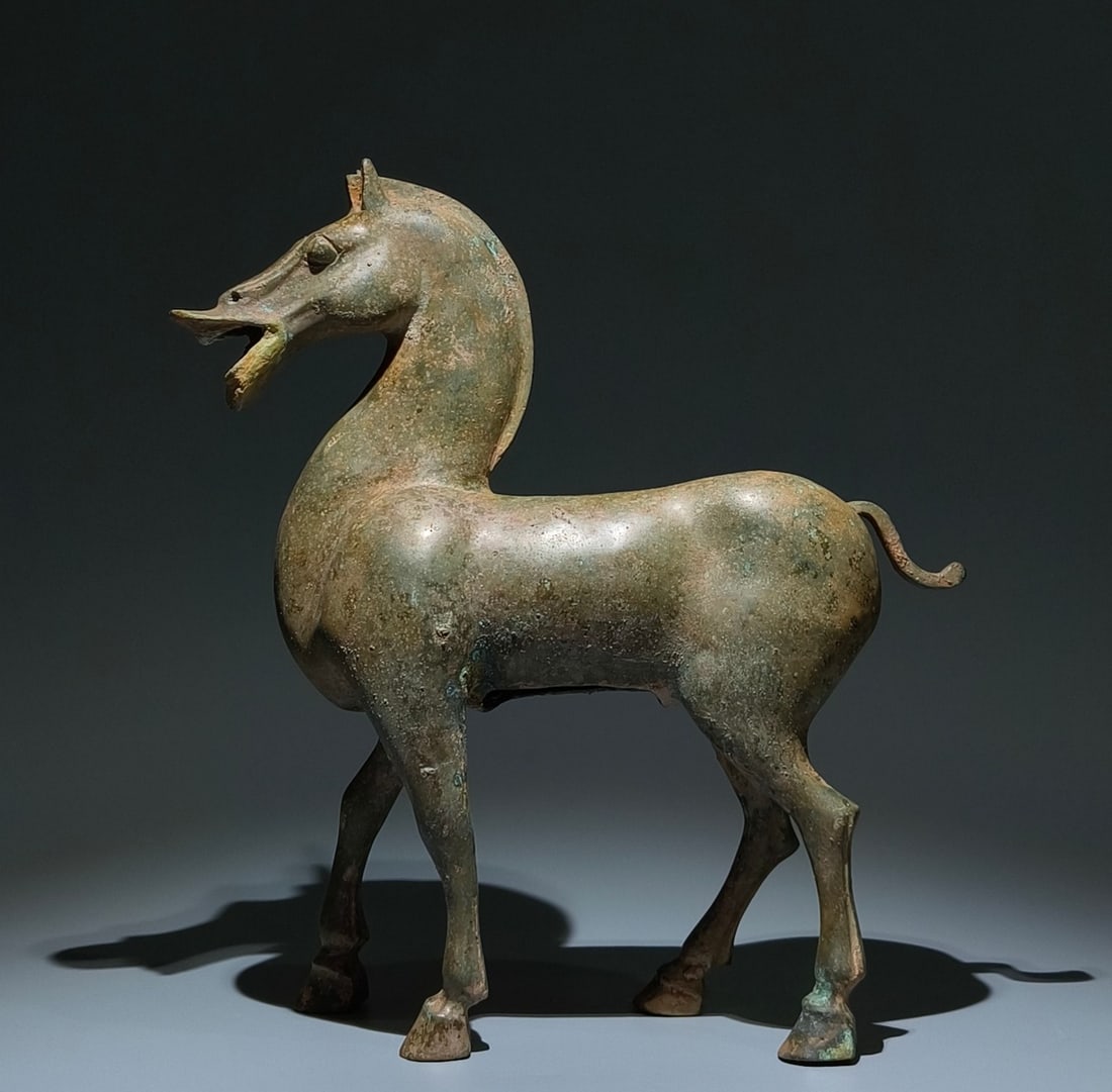 An Archaic Bronze Horse Ornament: An Archaic Bronze Horse Ornament,Han Dynasty, China,Size:15.7inx14.6inx4.3in 青铜马摆件,中国汉代