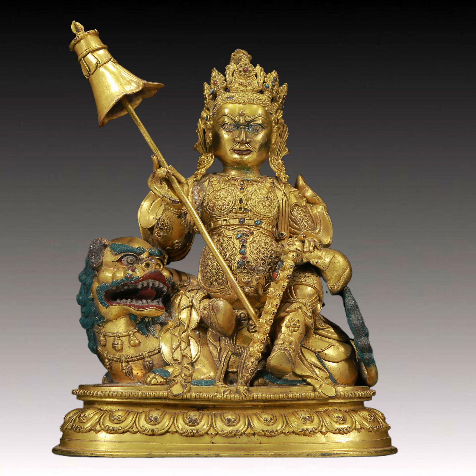 A Solemn Gilt Bronze Inlaid Gems Statue of Mammon Rides the Lion: A Solemn Gilt Bronze Inlaid Gems Statue of Mammon Rides the Lion,Ming Dynasty, China,Size: 7.9inx4.3inx9.8in,Weight:4615g 