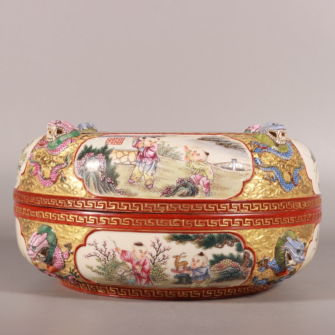 An Exquisite Enamel Gold Ground Flower,Figure and Dragon Pattern Box with Cover: An Exquisite Enamel Gold Ground Flower,Figure and Dragon Pattern Box with Cover,Qing Dynasty, China,Qianlong Four-character Mark,Size:3.9inx7.5in 