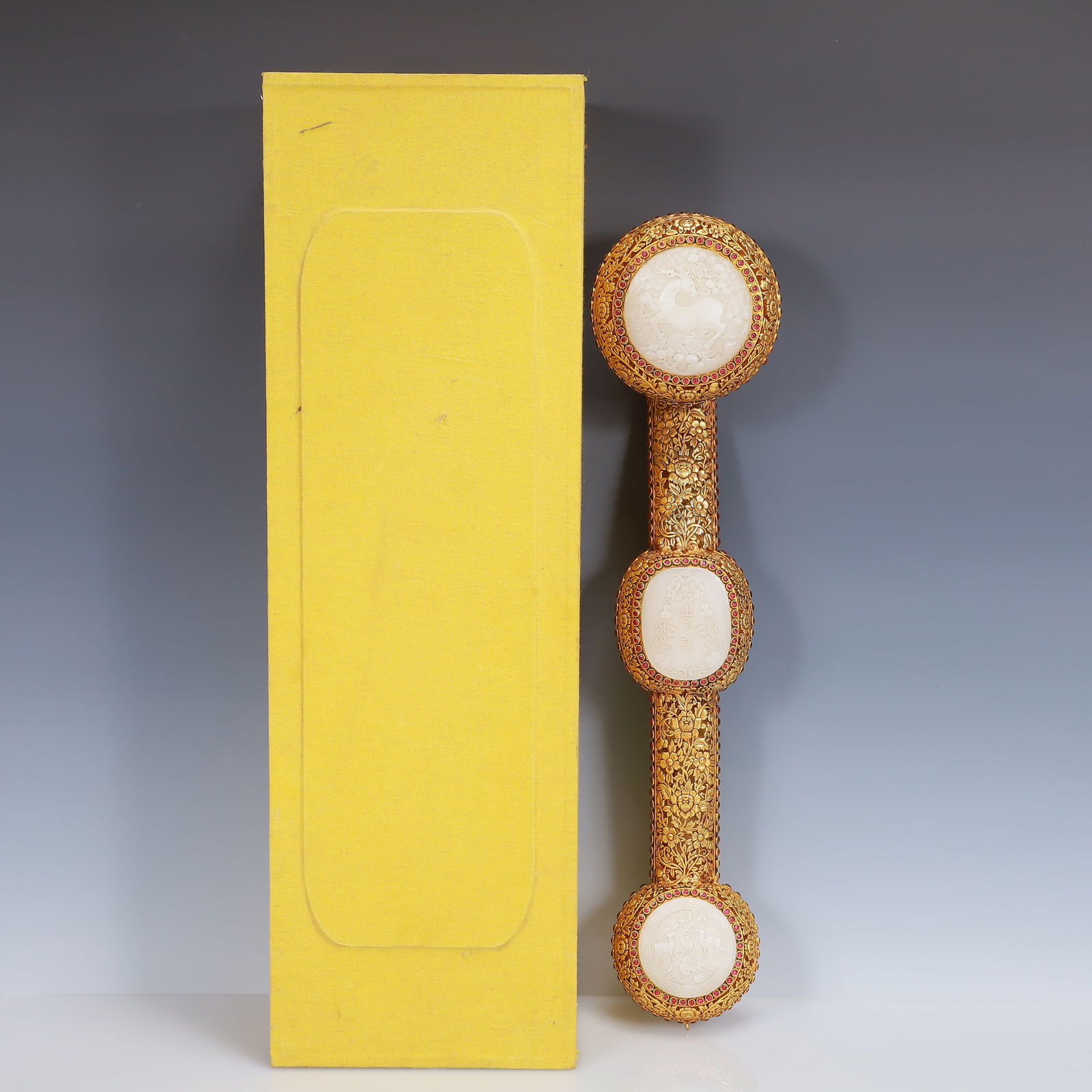 A Huge Gilt Bronze Inlaid White Jade Sika Deer Pattern Ruyi Ornament: A Huge Gilt Bronze Inlaid White Jade Sika Deer Pattern Ruyi Ornament,Qing Dynasty, China,Qianlong Six-Character Mark,Size:18.9inx4.3inx3.5in,(Box)21.7inx6.9inx5.1in,Weight:1150g 