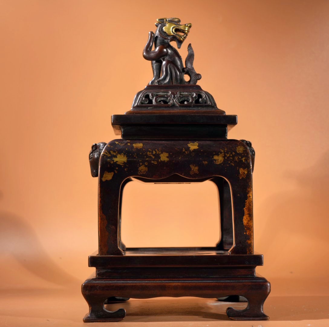 An Exquisite Bronze Sprinkled-Gold Goat-Ears Four Legs Censer,With Lion Cover,With Base: An Exquisite Bronze Sprinkled-Gold Goat-Ears Four Legs Censer,With Lion Cover,With Base,Ming Dynasty, China,Xunde Six-character Mark,Size:11.1inx4.3in,Weight:8030g 
