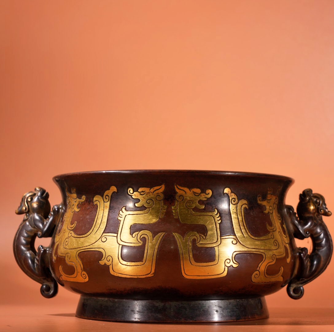 An Exquisite Gilt Bronze Dragon Pattern Beast-Ears Censer: An Exquisite Gilt Bronze Dragon Pattern Beast-Ears Censer,Qing Dynasty, China,With Mark,Size:3.5inx6in,Weight:2570g 