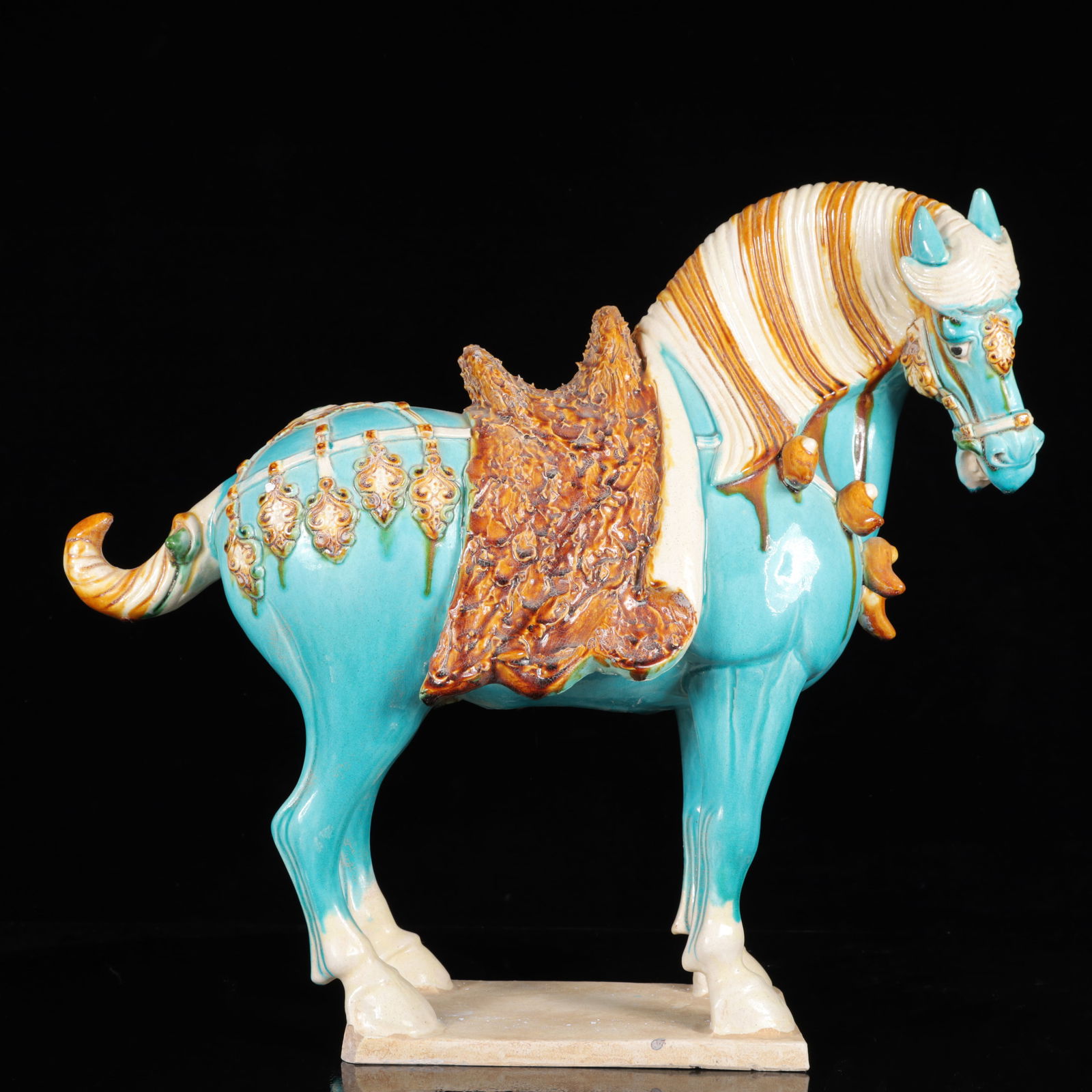 A Pair of Rare Tang Tri-Color Glazed Pottery Horse Ornaments: A Pair of Rare Tang Tri-Color Glazed Pottery Horse Ornaments,Tang Dynasty,China,Size:19.3inx7.5inx17.7in,Weight:12550g 