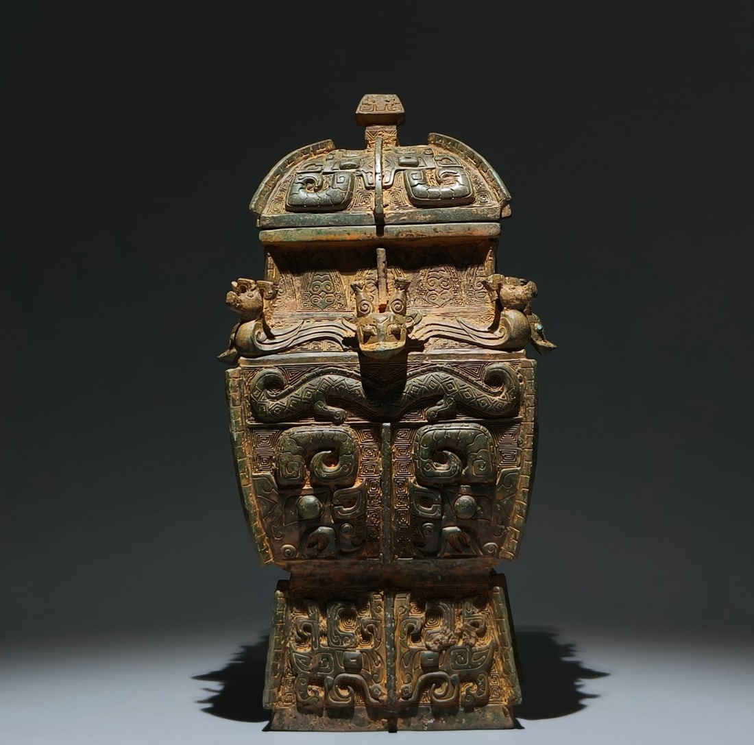 An Archaic Bronze Beast-Face Pattern Food Vessel,With Inscription: An Archaic Bronze Beast-Face Pattern Food Vessel,With Inscription,Shang Dynasty, China,Size:15inx7.1inx5.9in 青铜兽面纹食器,带铭文,中&