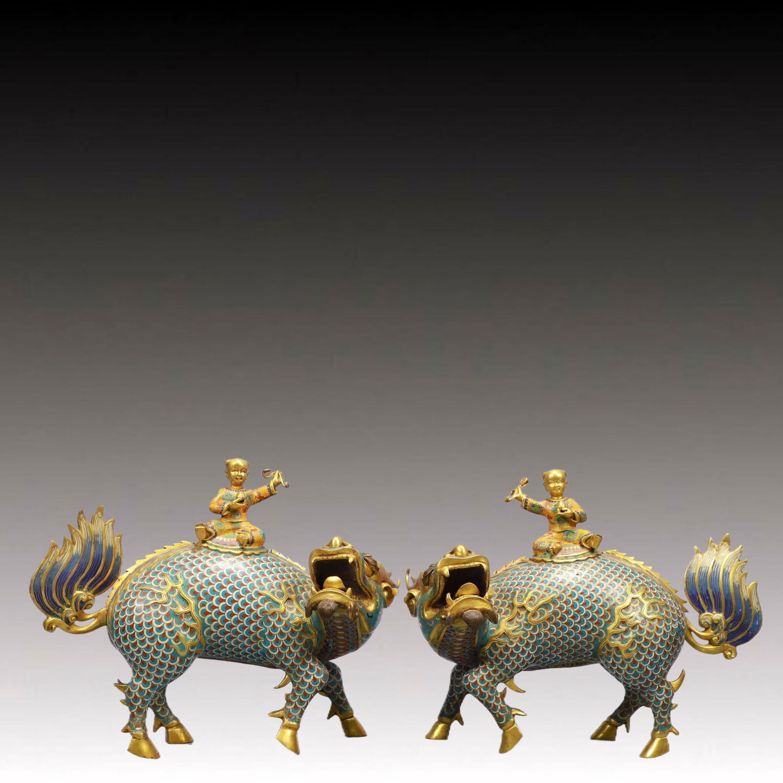 A Pair of Fine Cloisonne Kylin Ornaments: A Pair of Fine Cloisonne Kylin Ornaments,Qing Dynasty, China,With Mark,Size:15inx5.1inx11.8in ;Weight:12.5kg 