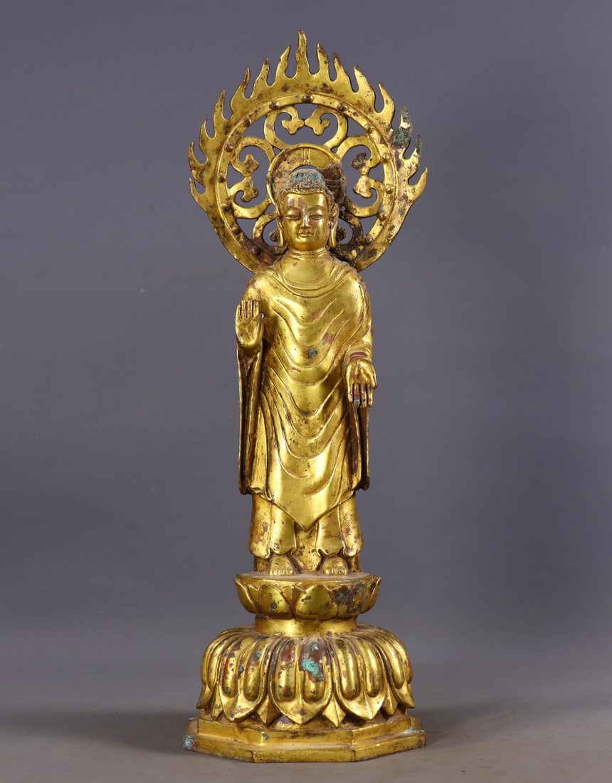 A Rare Gilt Bronze Buddha Statue: A Rare Gilt Bronze Buddha Statue,N.Wei , China,Size:12.6in,(Base)4.3in,Weight:1417g 铜鎏金佛像,中国北魏时期