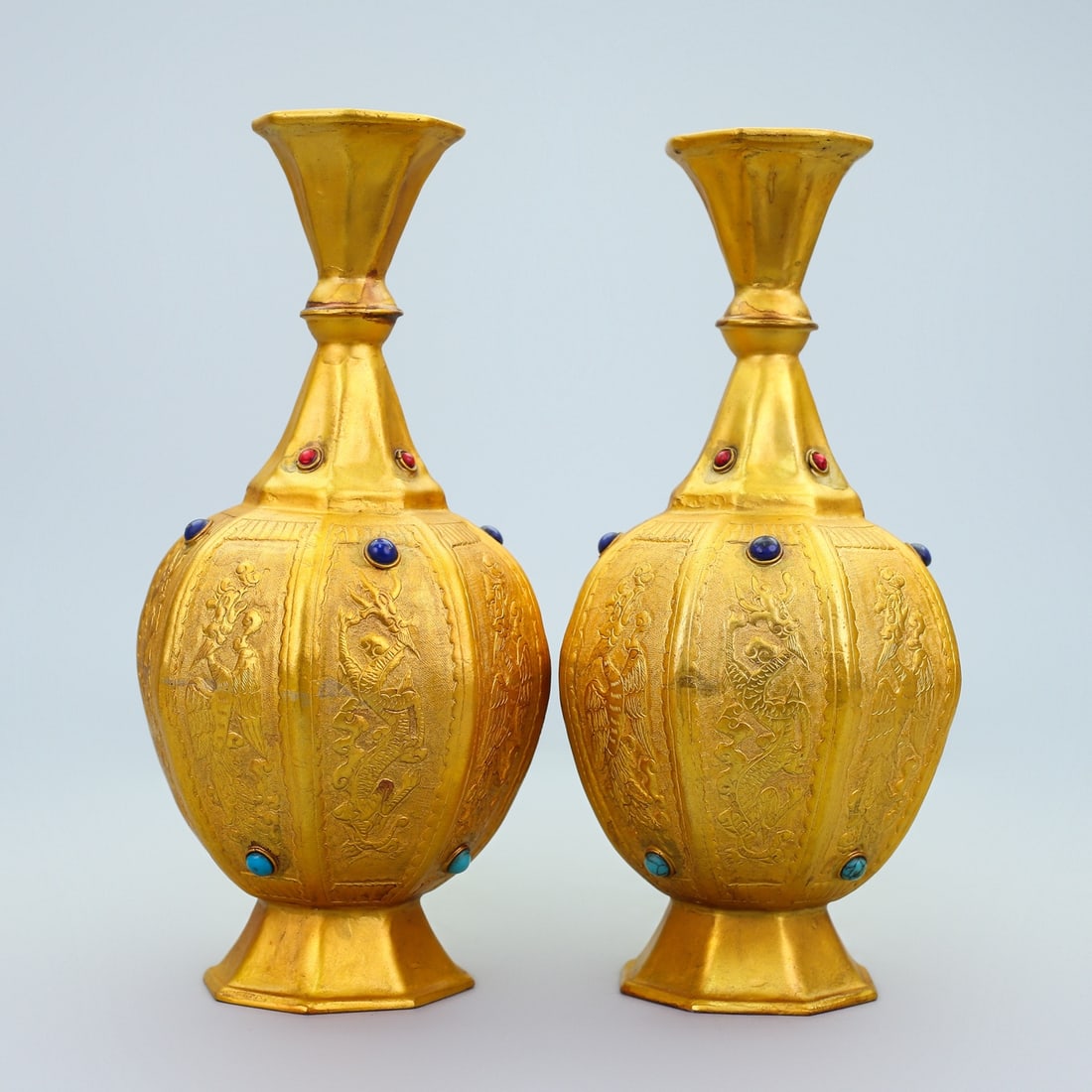 A Pair of Exquisite Gilt Bronze Dragon and Phoenix Pattern Vases,Inlaid Gems: A Pair of Exquisite Gilt Bronze Dragon and Phoenix Pattern Vases,Inlaid Gems,Tang Dynasty,China,Zhenguan Four-character Mark,Size:9.8inx4.3in,Weight:1310g 