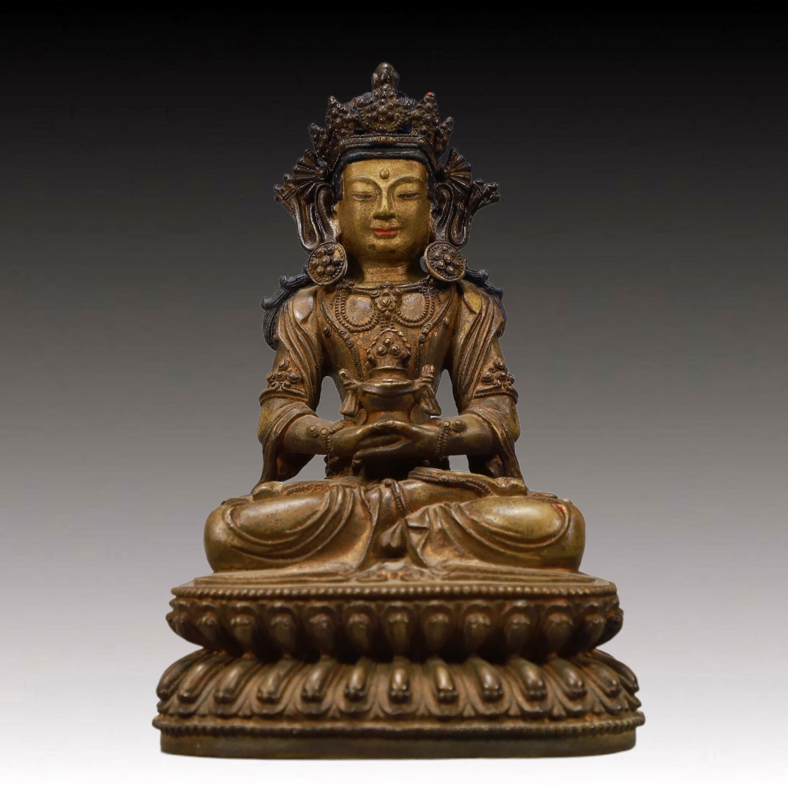 A Solemn Gilt Bronze Statue of Amitayus: A Solemn Gilt Bronze Statue of Amitayus,Qing Dynasty, China,Size:4.3inx3.5inx6.7in,Weight:1350g 铜鎏金无量寿佛像,中国清代