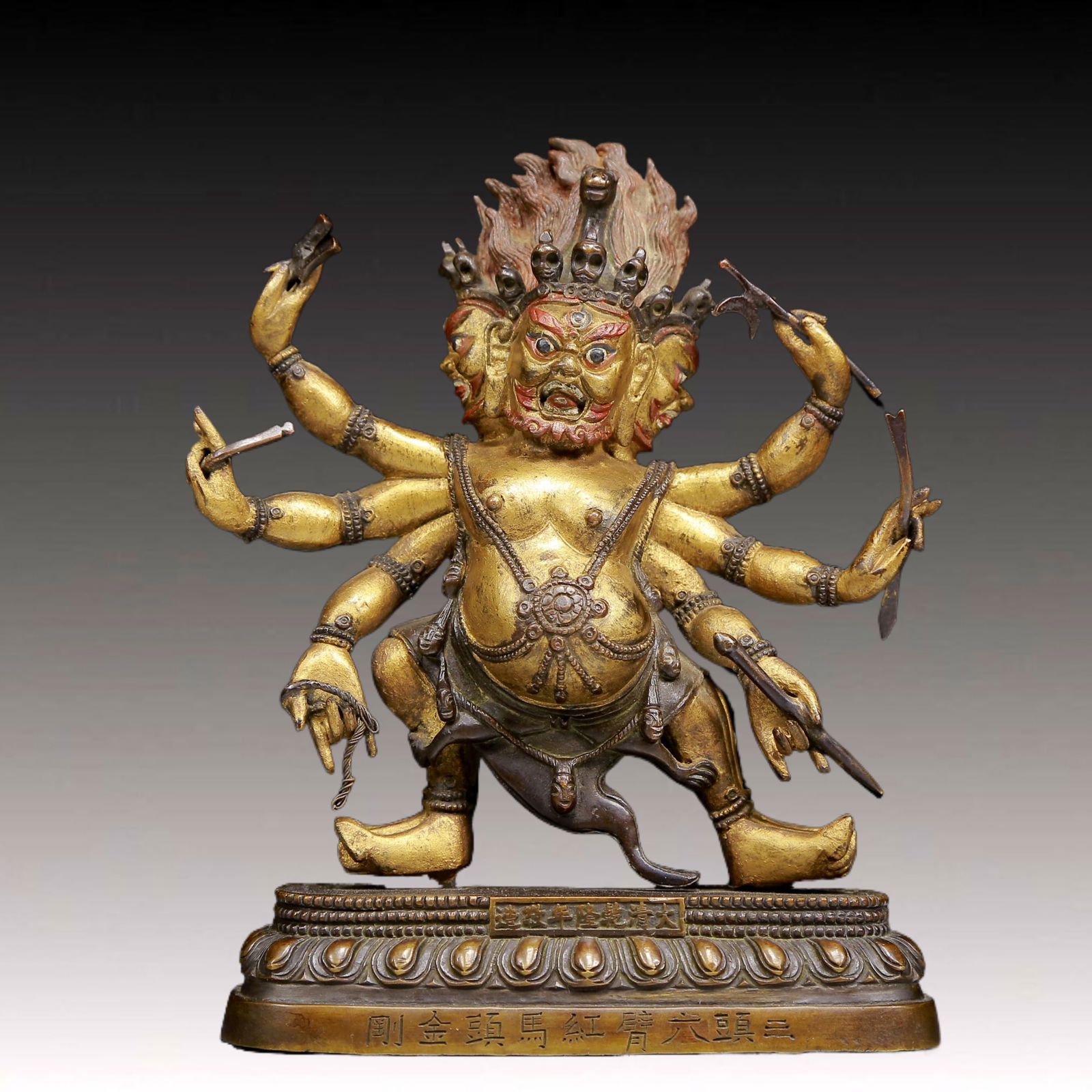 A Solemn Gilt Bronze Statue of Three-Headed and Six-Armed Vajra: A Solemn Gilt Bronze Statue of Three-Headed and Six-Armed Vajra,Ming Dynasty, China,Size:5.3inx2.8inx7.1in,Weight:1850g 