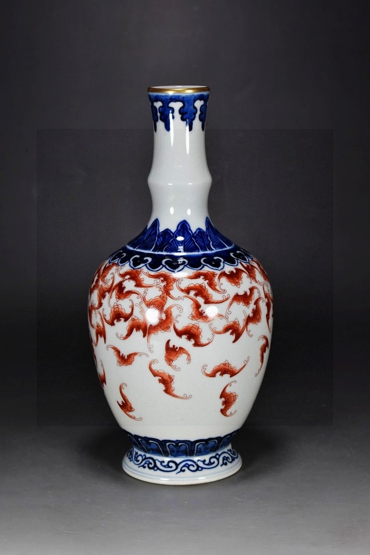 An Exquisite Blue and White Iron-Red Color Painted Gold Bats Pattern Vase: An Exquisite Blue and White Iron-Red Color Painted Gold Bats Pattern Vase,Qing Dynasty, China,Qianlong Six-character Mark,Size:9.4inx4.7in 