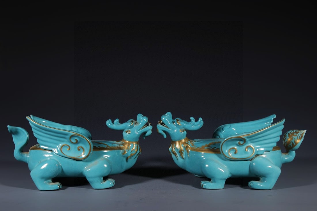 A Pair of Rare Guan yao Turquoise Glazed Painted Gold Auspicious Beast Ornaments: A Pair of Rare Guan yao Turquoise Glazed Painted Gold Auspicious Beast Ornaments,Qing Dynasty, China,Qianlong Six-character Mark,Size:11.8inx6.3inx5.4in 