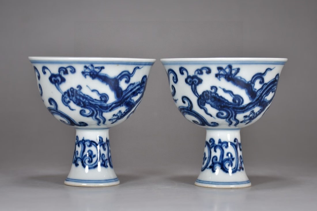 A Pair of Exquisite Blue and White Ganoderma lucidum and Dragon Pattern Stem Cups: A Pair of Exquisite Blue and White Ganoderma lucidum and Dragon Pattern Stem Cups,Ming Dynasty, China,Xuande Six-character Mark,Size:3.5inx3.3in 
