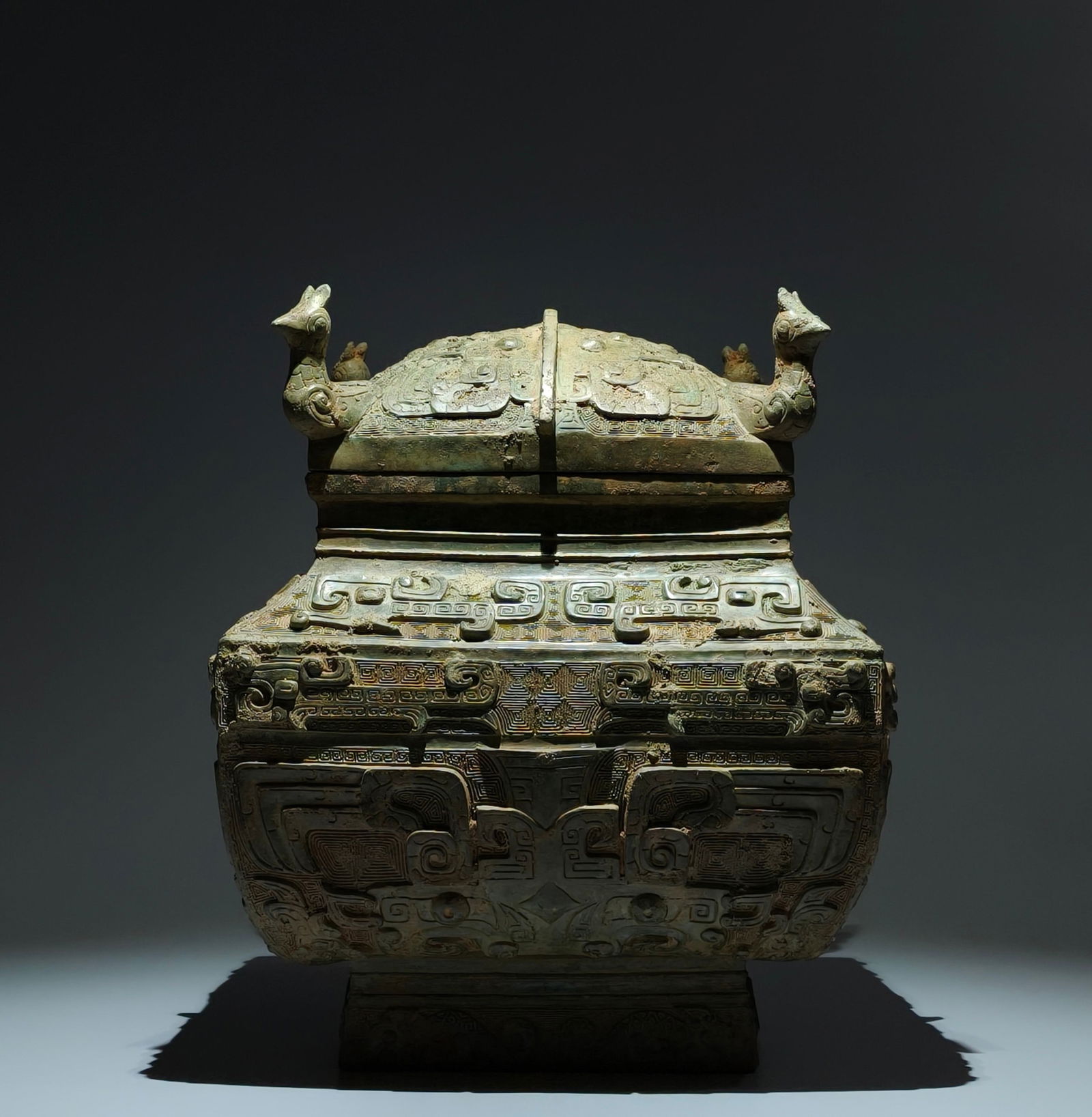 An Archaic Bronze Beast-Face Pattern Food Vessel: An Archaic Bronze Beast-Face Pattern Food Vessel,Sang Dynasty,China,Size:15.4inx12.6in 青铜兽面纹食器,中国商代