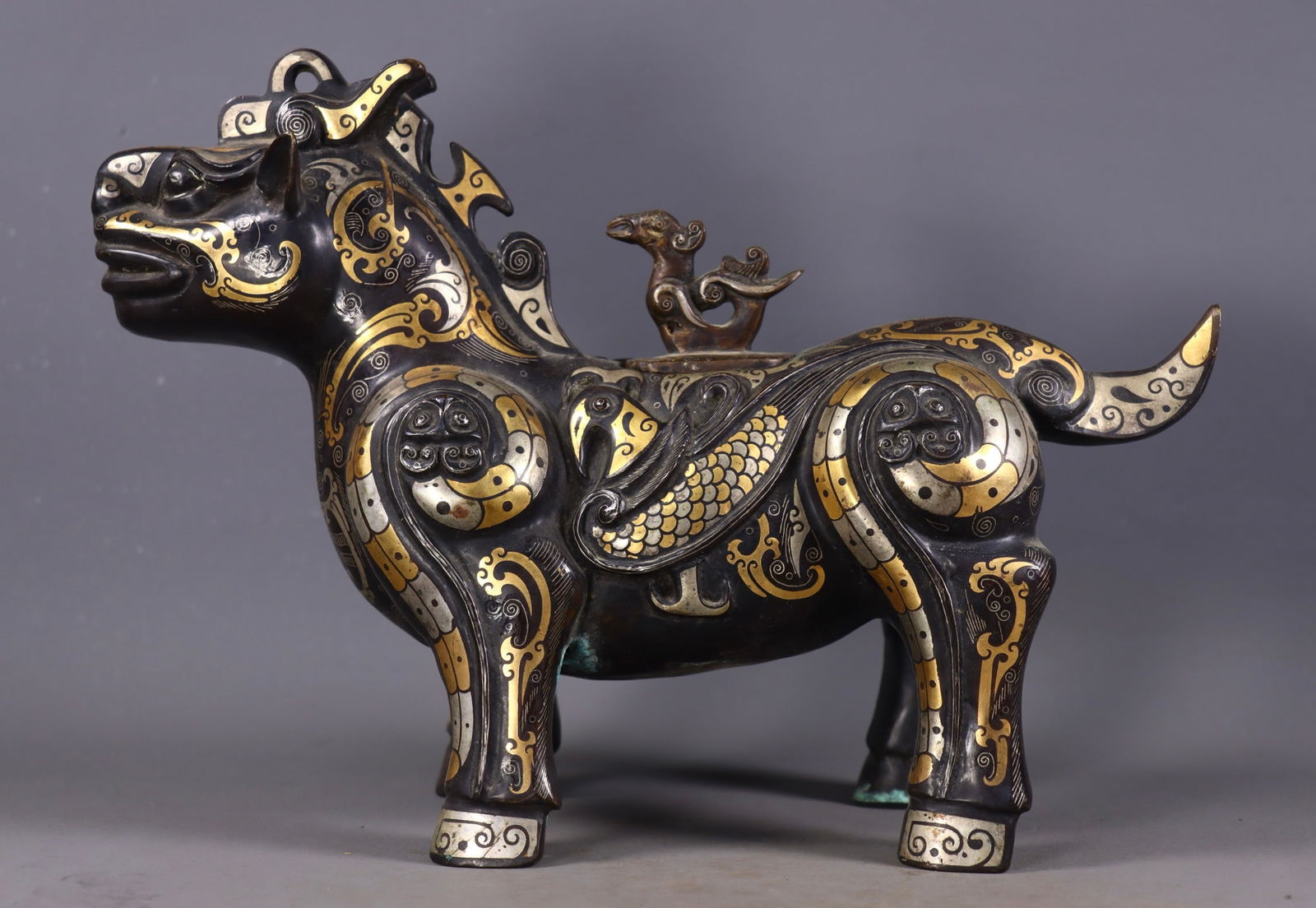 A Rare Bronze Inlaid Gold and Silver Auspicious Beast Ornament (1 of 9)