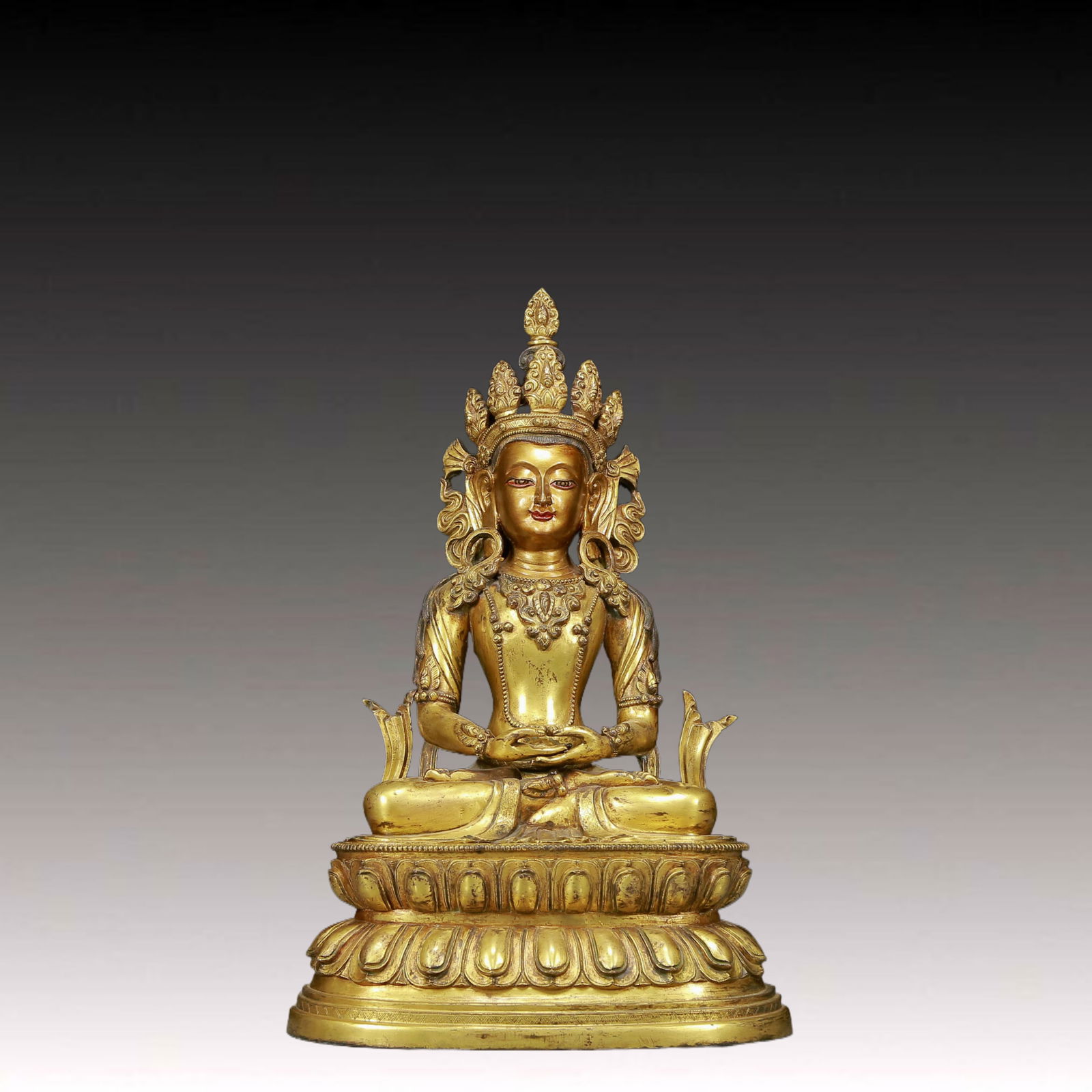 A Solemn Gilt Bronze Statue of Amitayus: A Solemn Gilt Bronze Statue of Amitayus,Ming Dynasty, China,Size:12.2inx9.1inx19.3in,Weight:14840g 铜鎏金无量寿佛像，明代