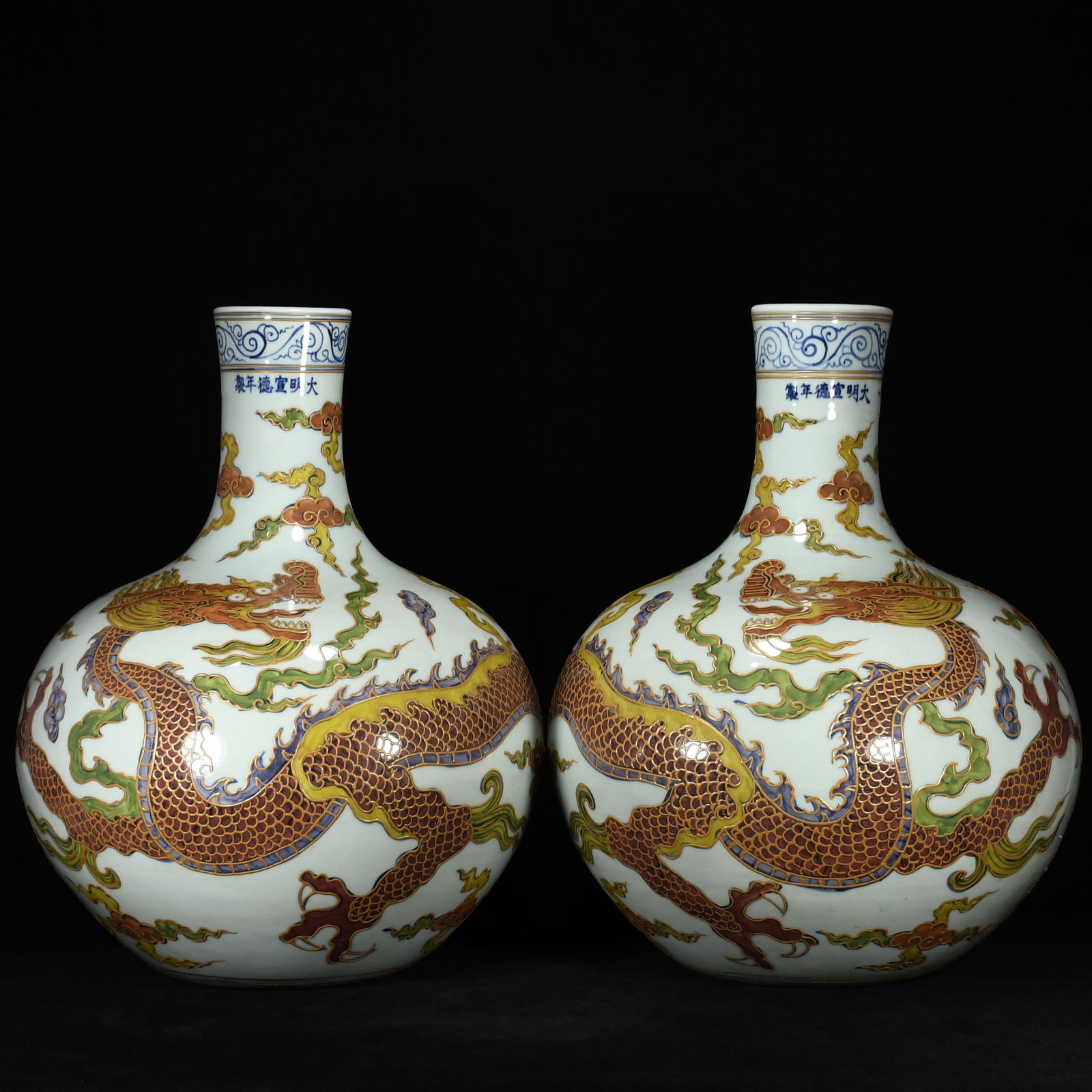 A Pair of Huge Wucai Paste relief Auspicious Cloud and Dragon Pattern Vases: A Pair of Huge Wucai Paste relief Auspicious Cloud and Dragon Pattern Vases,Ming Dynasty, China,Xuande Six-character Mark,Size:16.9inx13.8in 一对五彩沥粉祥