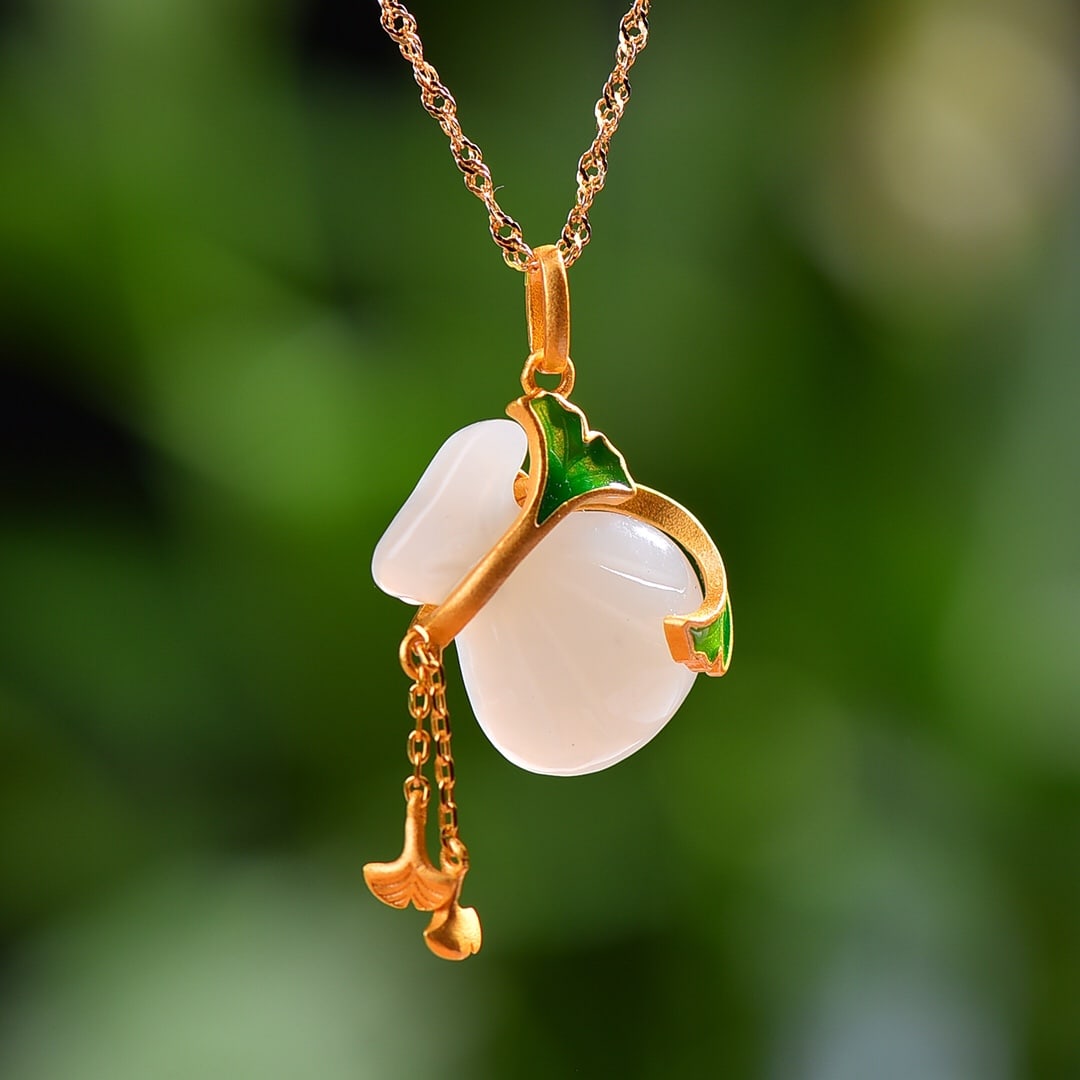 A Set of Fine Sterling Silver-Gold Plated Inlaid White Jade Enamel Jewelrys: A Set of Fine Sterling Silver-Gold Plated Inlaid White Jade Enamel Jewelrys,Size:(Bracelet)14mmx18mm,(Earrings)11mmx13mm,(Pendant)14mmx22mm 
