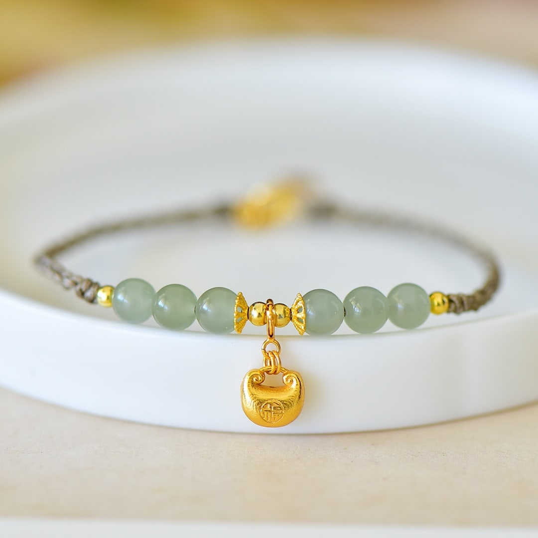 An Exquisite Sterling Silver-Gold Plated Inlaid Greenish Jade Bracelets: An Exquisite Sterling Silver-Gold Plated Inlaid Greenish Jade Bracelets,Size:6mmx6mm 纯银镀金镶青白玉手链