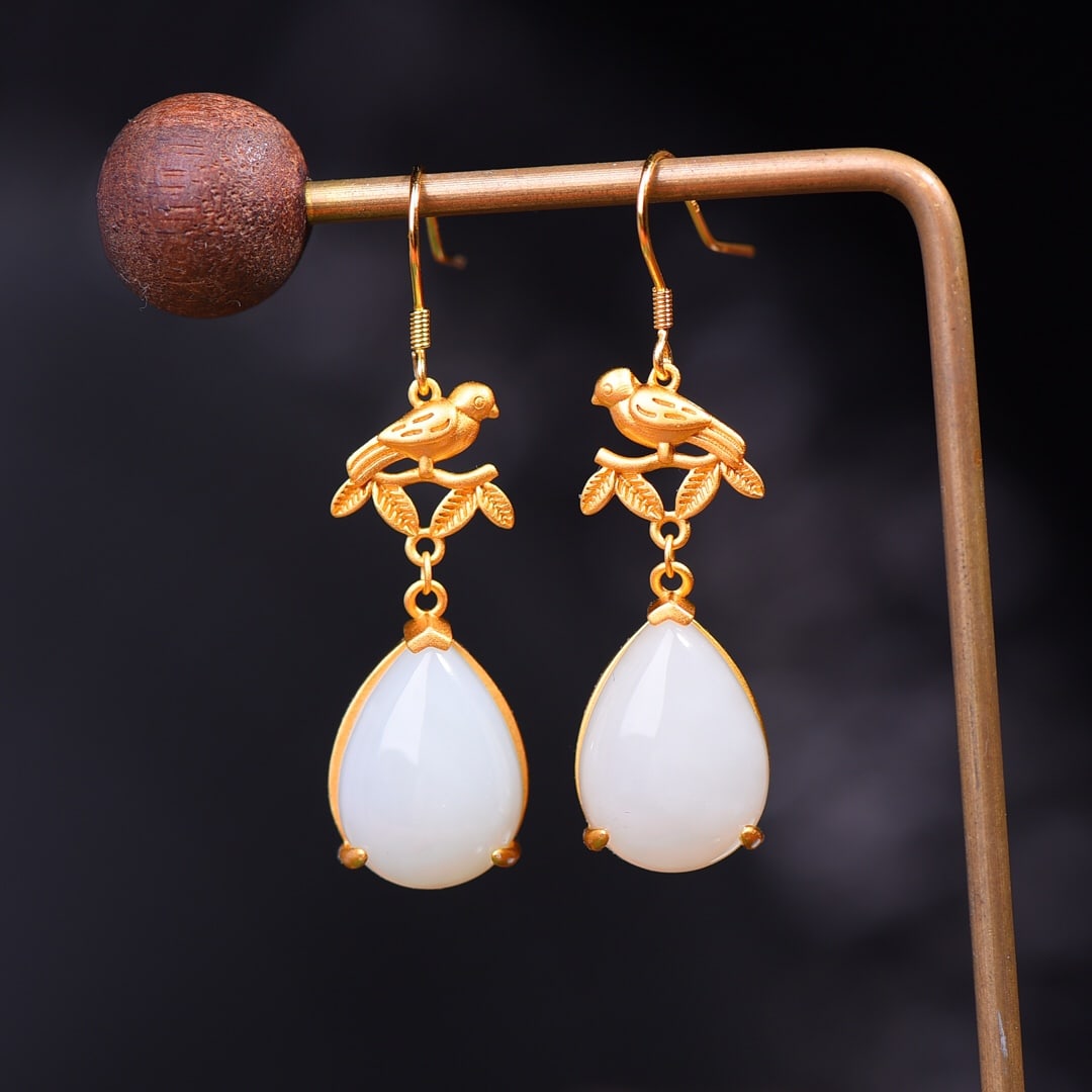 A Pair of Exquisite Sterling Silver-Gold Plated Inlaid White Jade Earrings: A Pair of Exquisite Sterling Silver-Gold Plated Inlaid White Jade Earrings,Size:13mmx18mm 一对纯银镀金镶白玉耳环