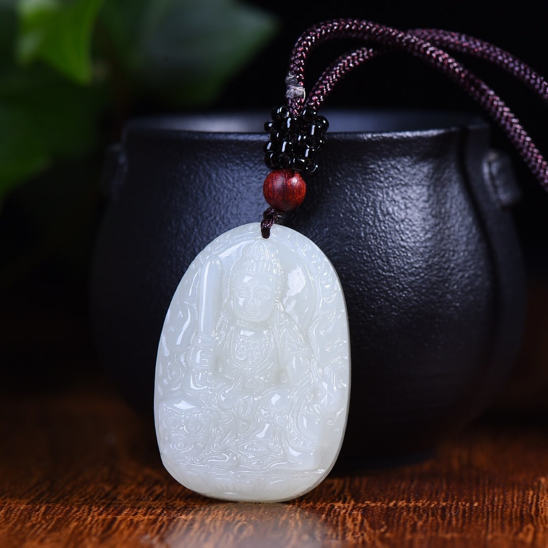 An Exquisite White Jade Manjusri Pattern Pendant: An Exquisite White Jade Manjusri Pattern Pendant,Size:28mmx38mm (寓意)属兔年 生人虔诚 增长智慧 学业