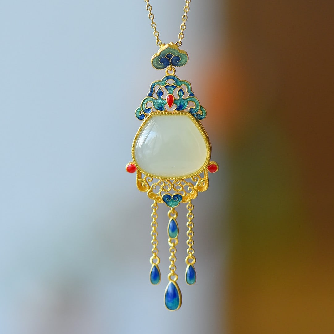 An Exquisite Sterling Silver-Gold Plated Inlaid White Jade Pendant: An Exquisite Sterling Silver-Gold Plated Inlaid White Jade Pendant 纯银镀金镶白玉吊坠