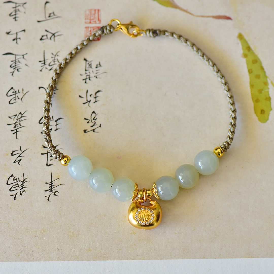 An Exquisite Sterling Silver-Gold Plated Inlaid Greenish Jade Bracelets: An Exquisite Sterling Silver-Gold Plated Inlaid Greenish Jade Bracelets,Size:8mmx8mm 纯银镀金镶青白玉手链
