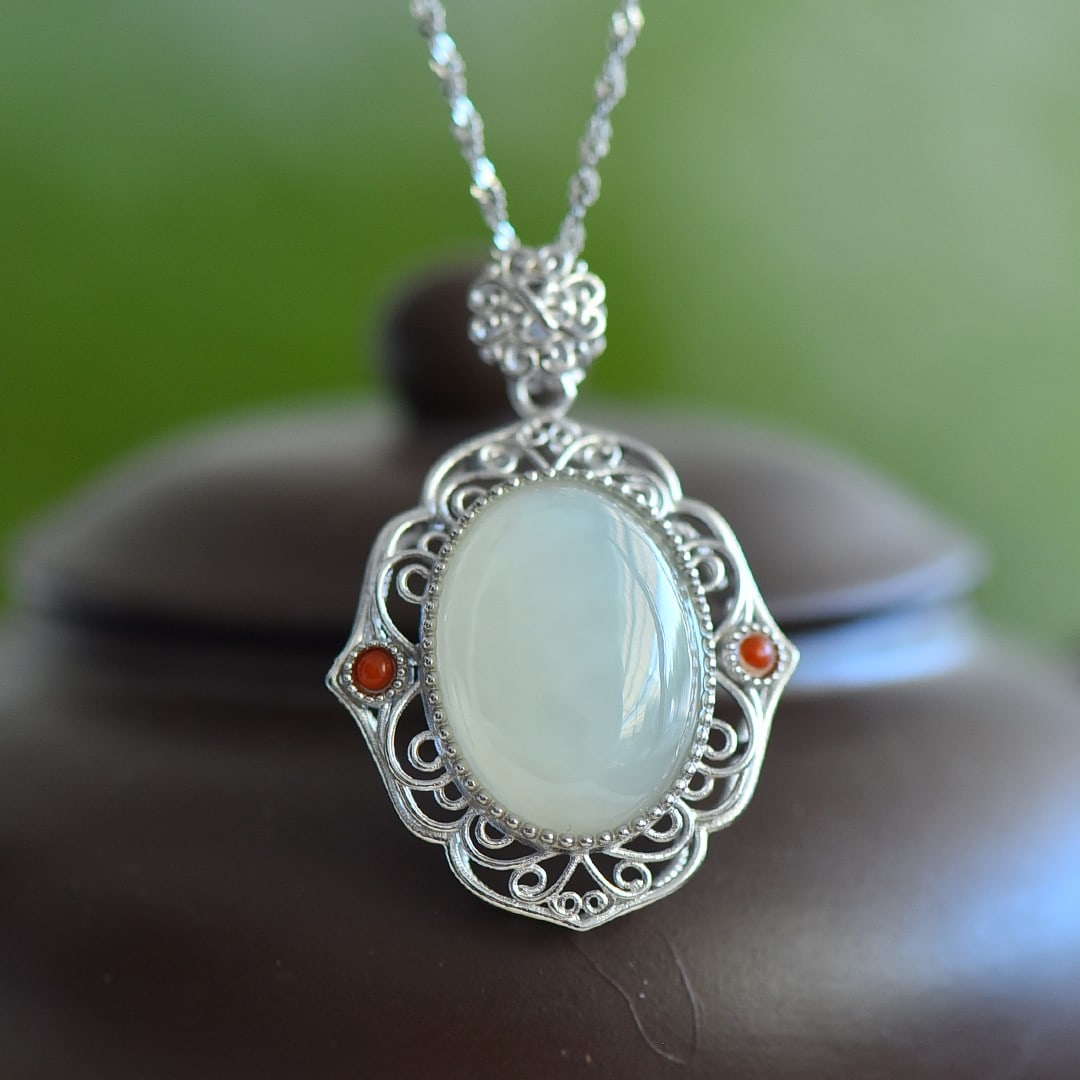 An Exquisite Sterling Silver Inlaid White Jade Pendant: An Exquisite Sterling Silver Inlaid White Jade Pendant 纯银镶白玉吊坠