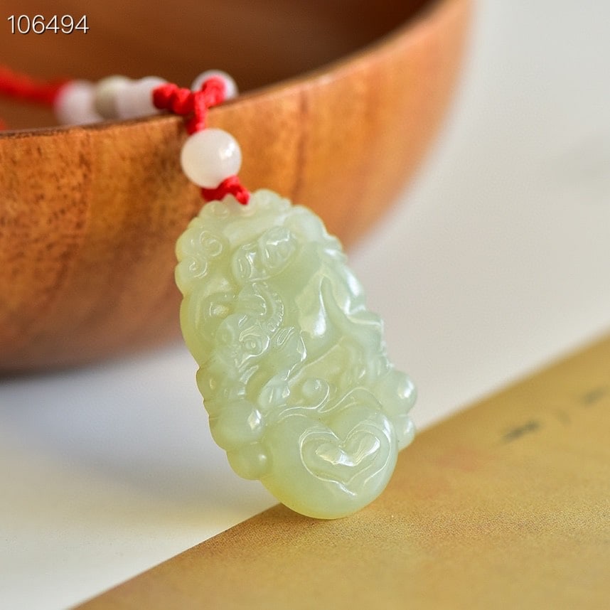 An Exquisite White Jade Buffalo Pattern Pendant - 2