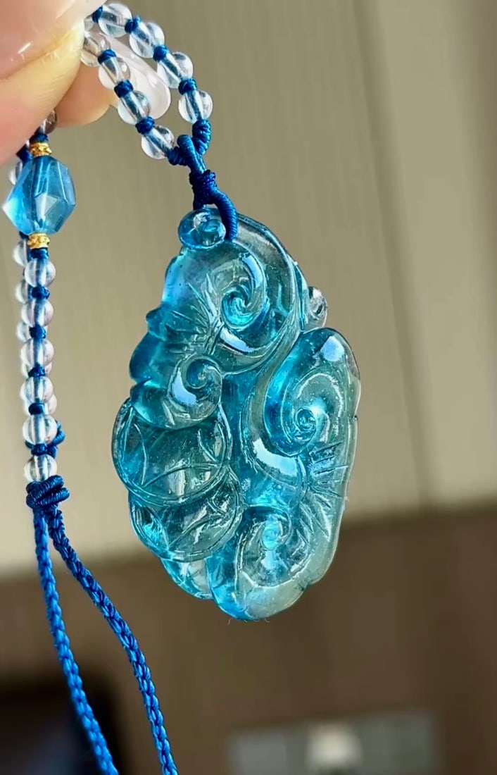 An Exquisite Aquamarine Pendant: An Exquisite Aquamarine Pendant,Size:51mmx34mmx8mm,Total Weight:22.2g 海蓝宝吊坠