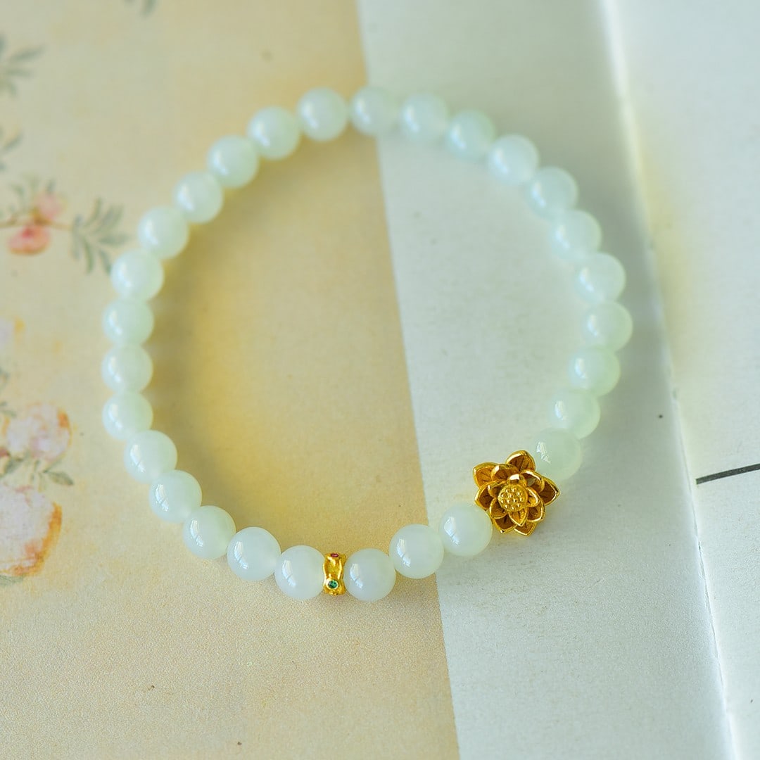 An Exquisite Sterling Silver-Gold Plated Inlaid White Jade Bracelet: An Exquisite Sterling Silver-Gold Plated Inlaid White Jade Bracelet 纯银镀金镶白玉手链