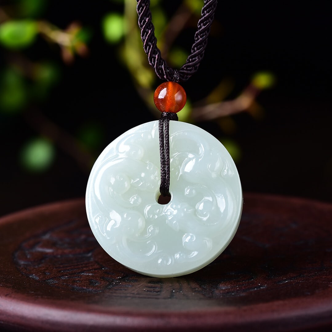 An Exquisite White Jade Dragon Pattern Pendant: An Exquisite White Jade Dragon Pattern Pendant,Size:30mmx30mm 白玉龙纹吊坠